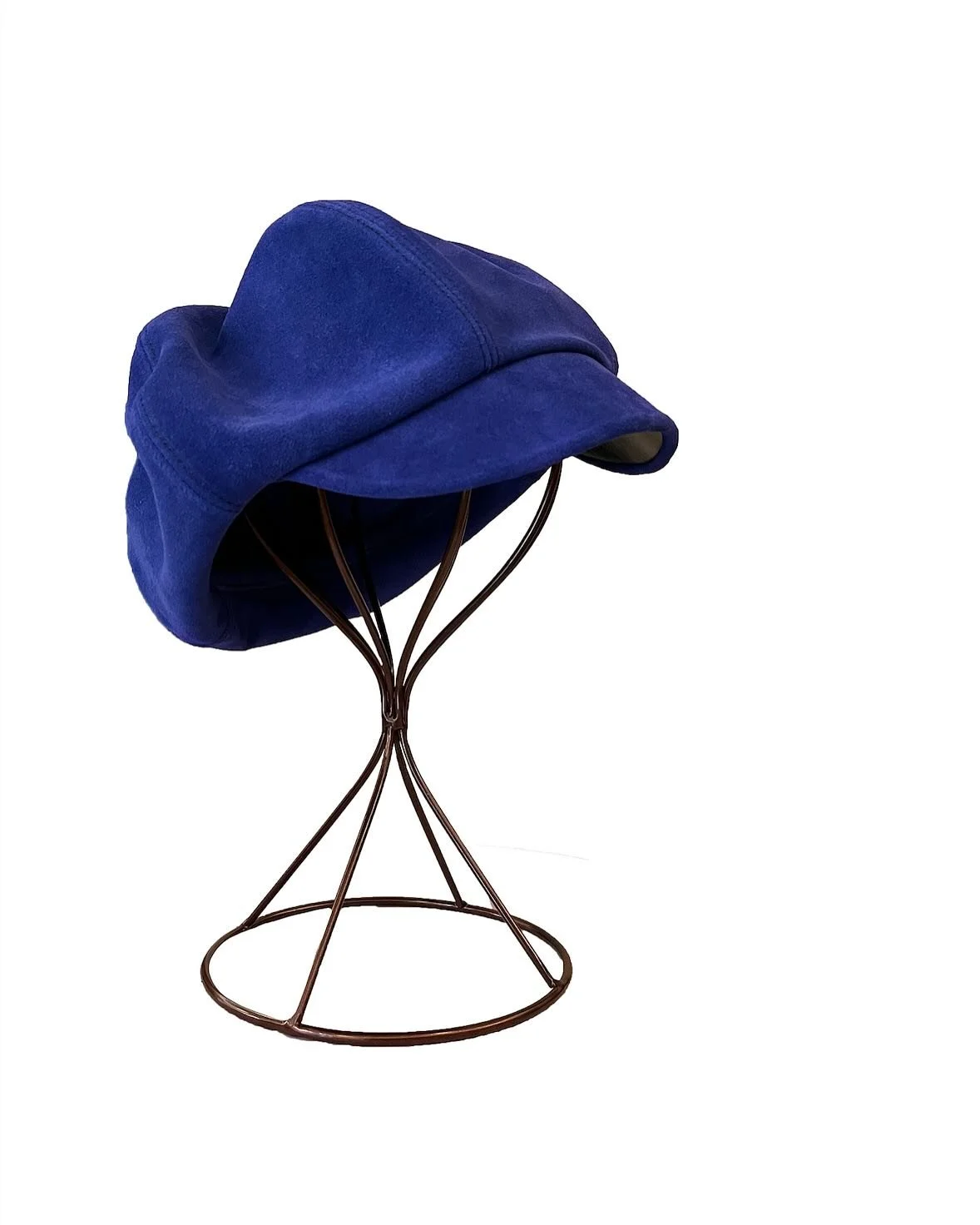 Blue suede bakers cap with brim made of black 5-6oz full grain leather

#hatmaking #suedehat #millinery #leathermillinery #leather #leathercraft