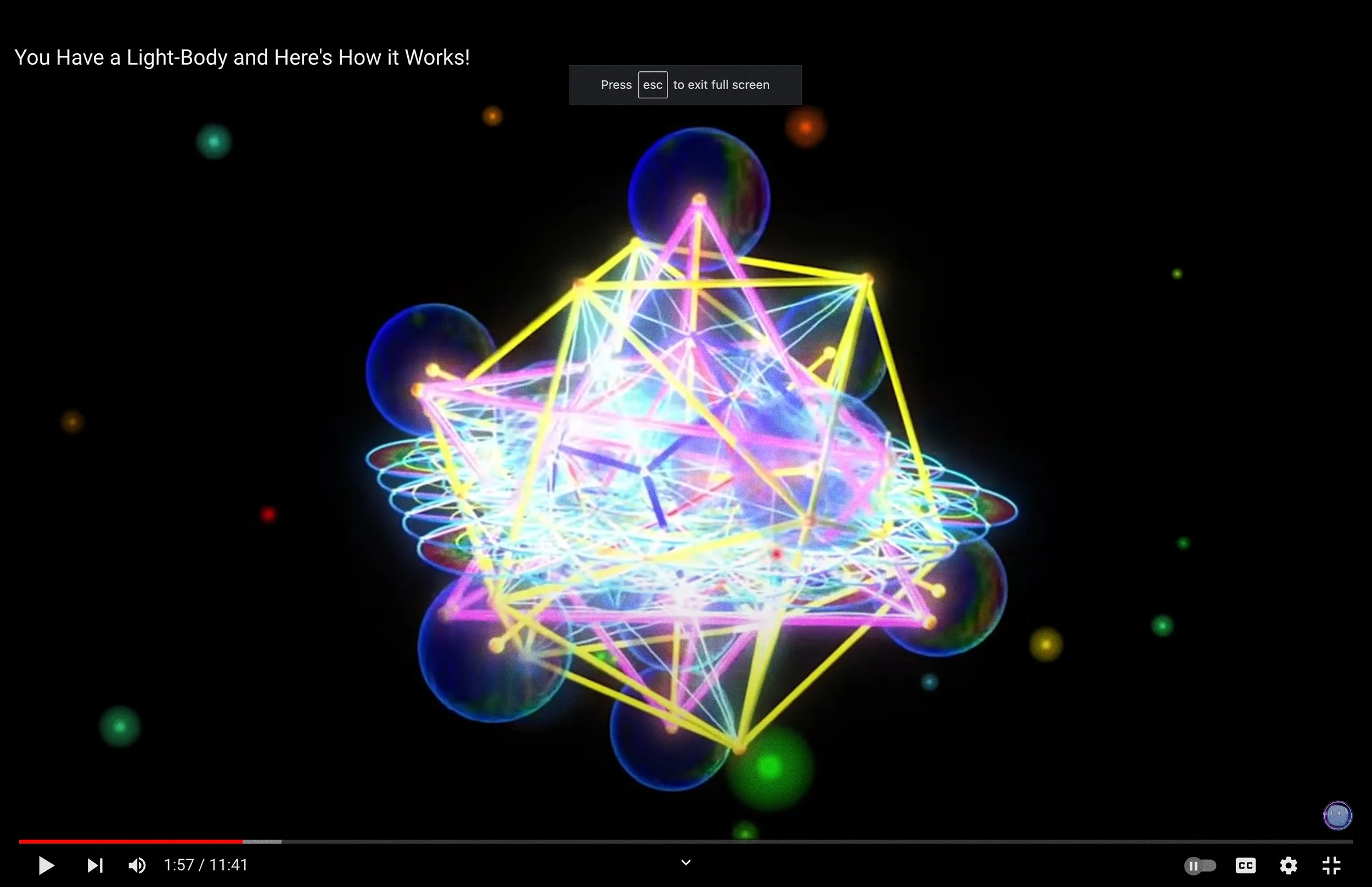 A colorful digital graphic depicting a glowing geometric structure made of interconnected lines and nodes, resembling a light-body or energy form, with floating orbs of various colors surrounding it.