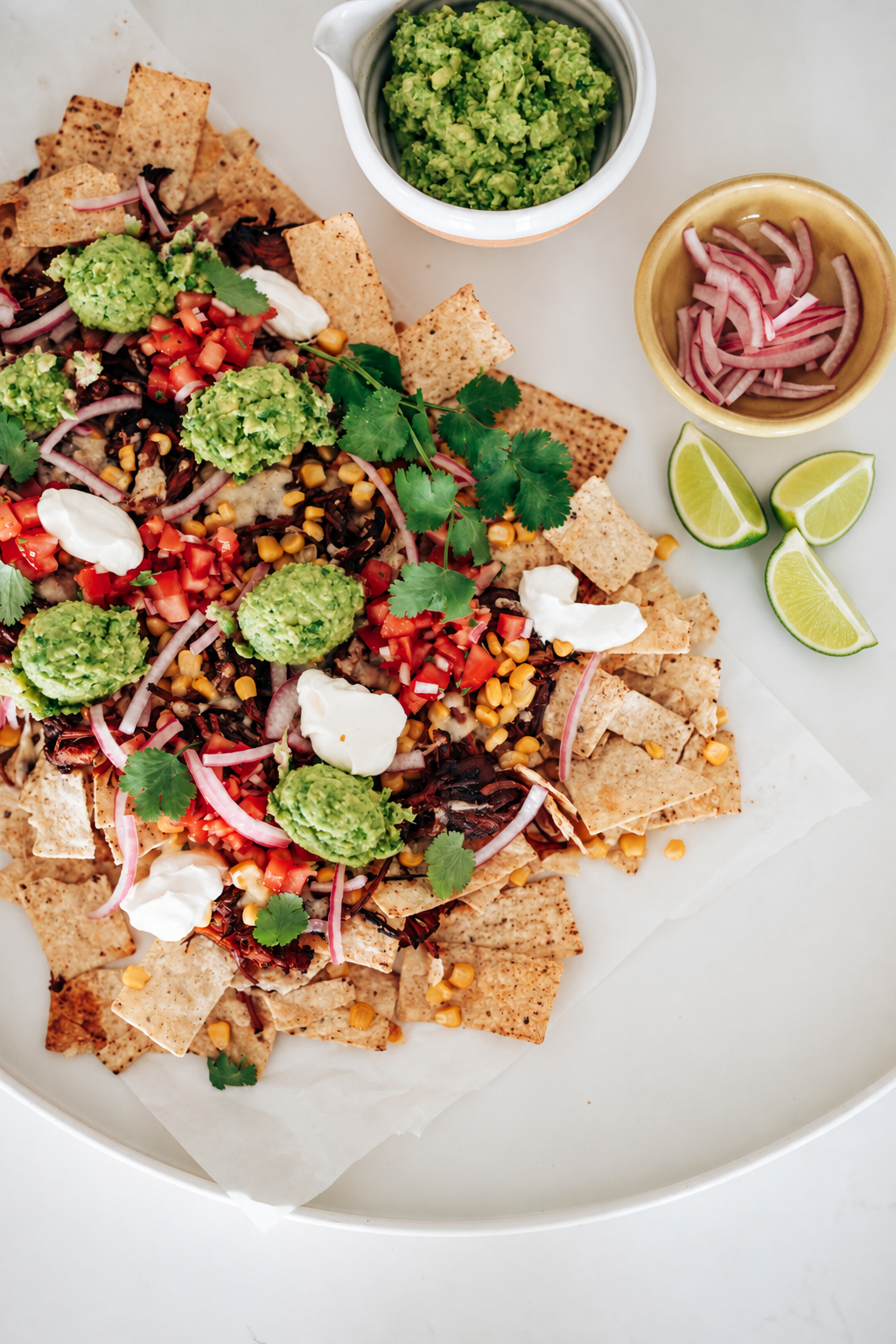 Loaded pork nachos with lime &amp; jalapeno guacamole