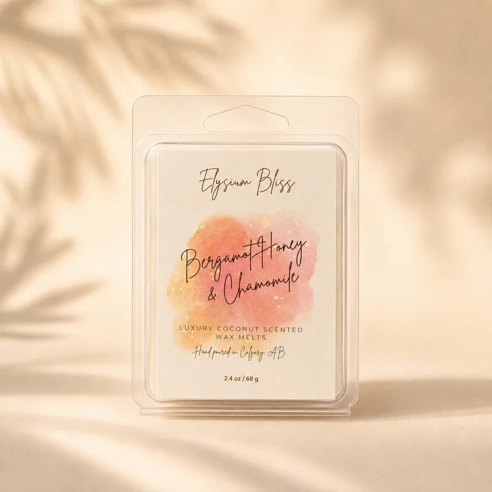 Elysium Bliss Bergamot Honey & Chamomile luxury coconut wax melts in a clear clamshell with watercolour label, on a warm cream background with soft palm-frond shadow.