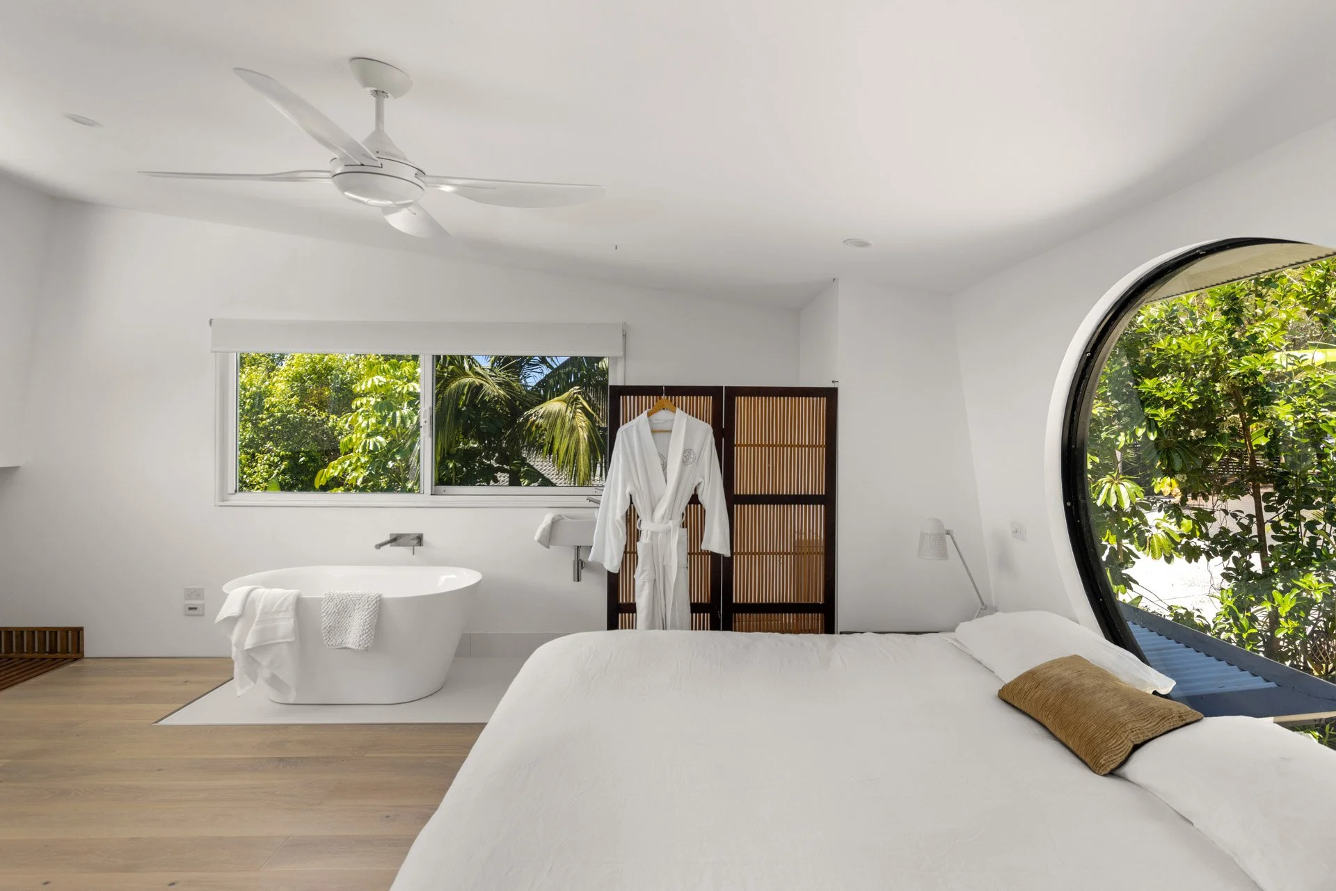 Relax in the spacious loft king bedroom with its beautiful freestanding bath and garden views.