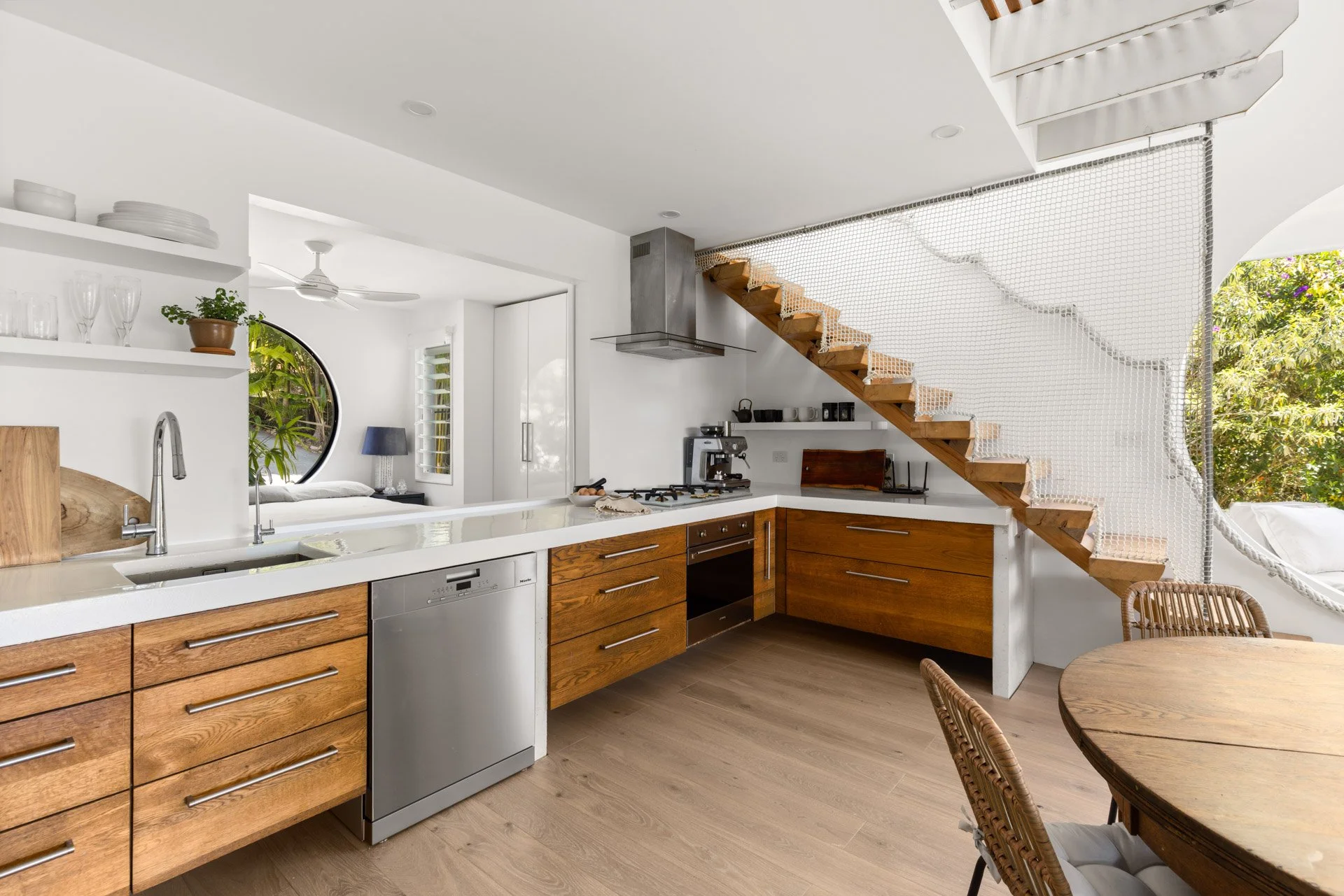 Beautifully appointed kitchen with timber cabinetry, generous bench space and modern appliances.