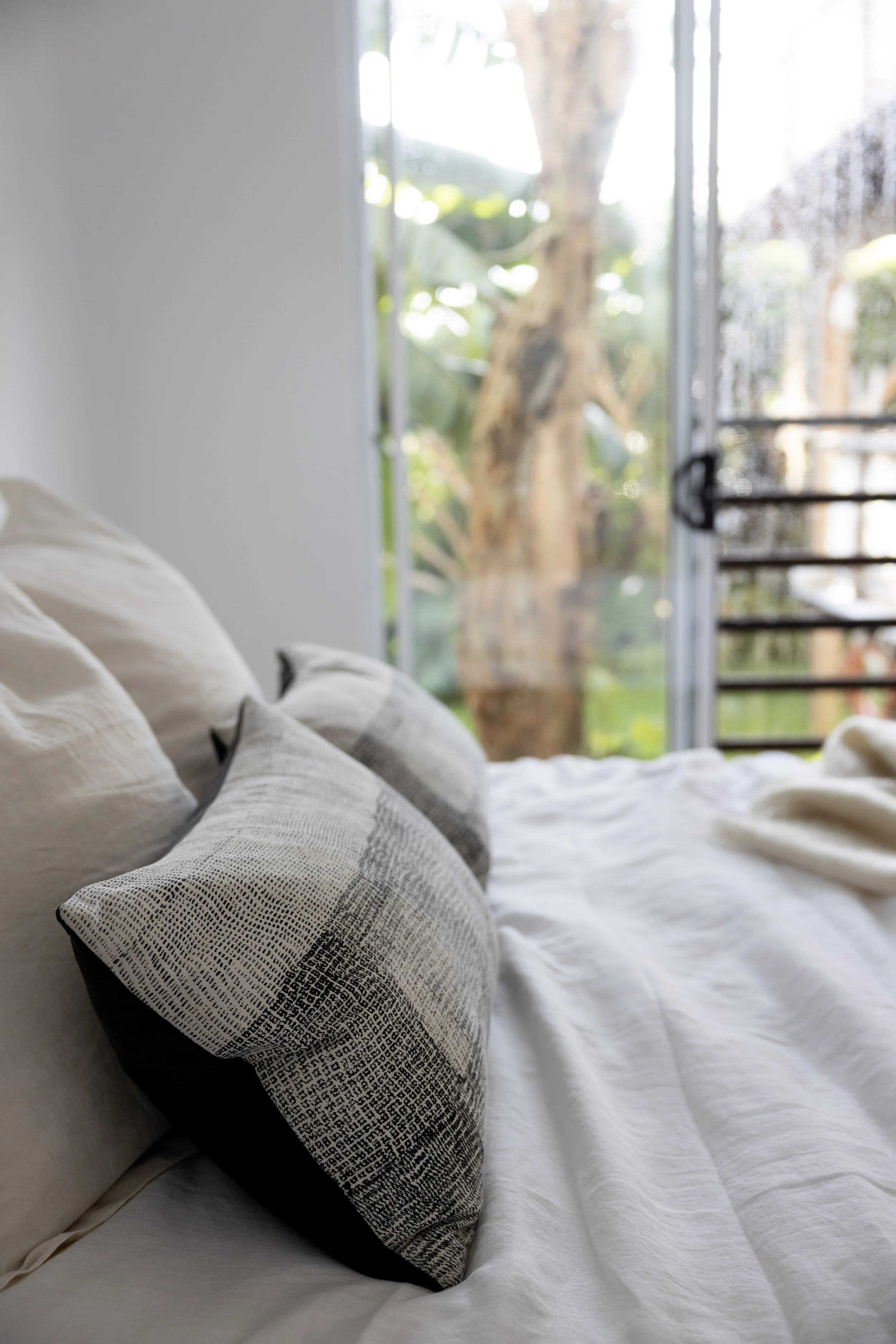 Lush private tropical garden views from both bedrooms Haven Tropicana