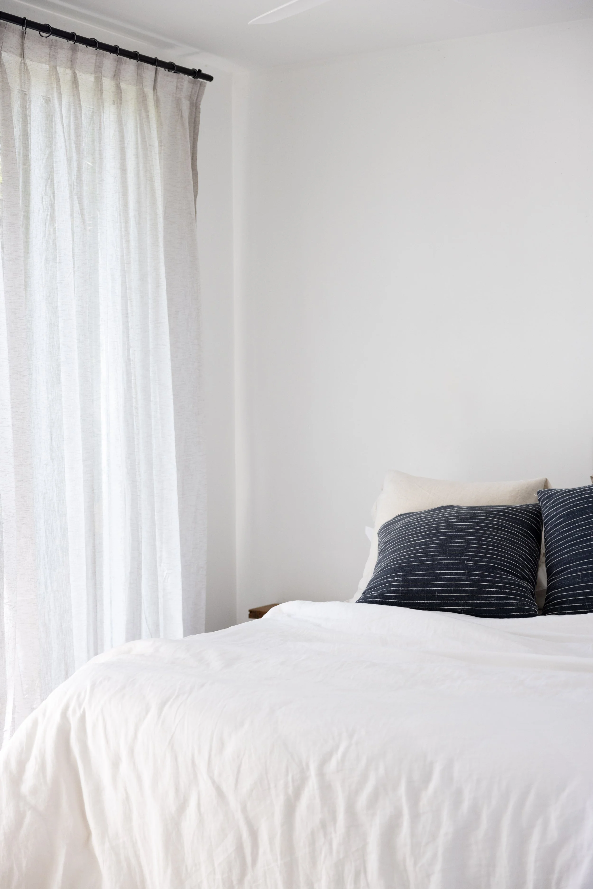 Minimal coastal bedroom retreat at Haven Tropicana