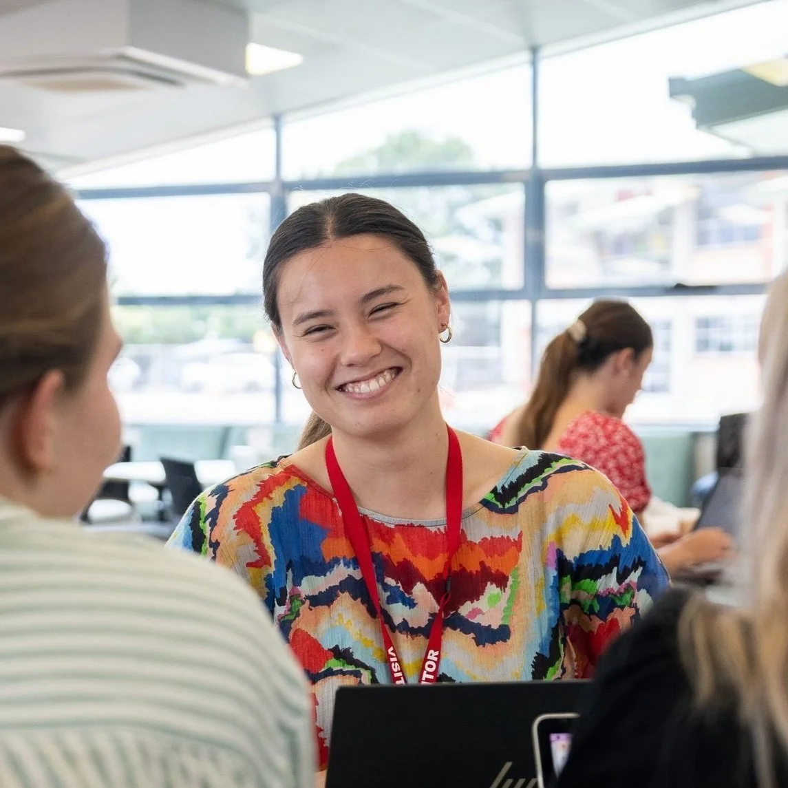 teacher-trainee-smiling-at-bespoke-session-with-peers.jpg