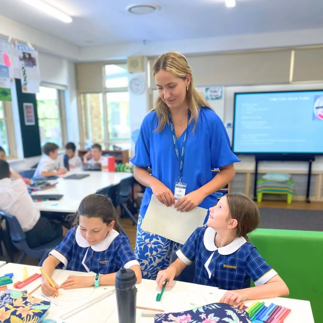 Female teacher trainee with students.jpg