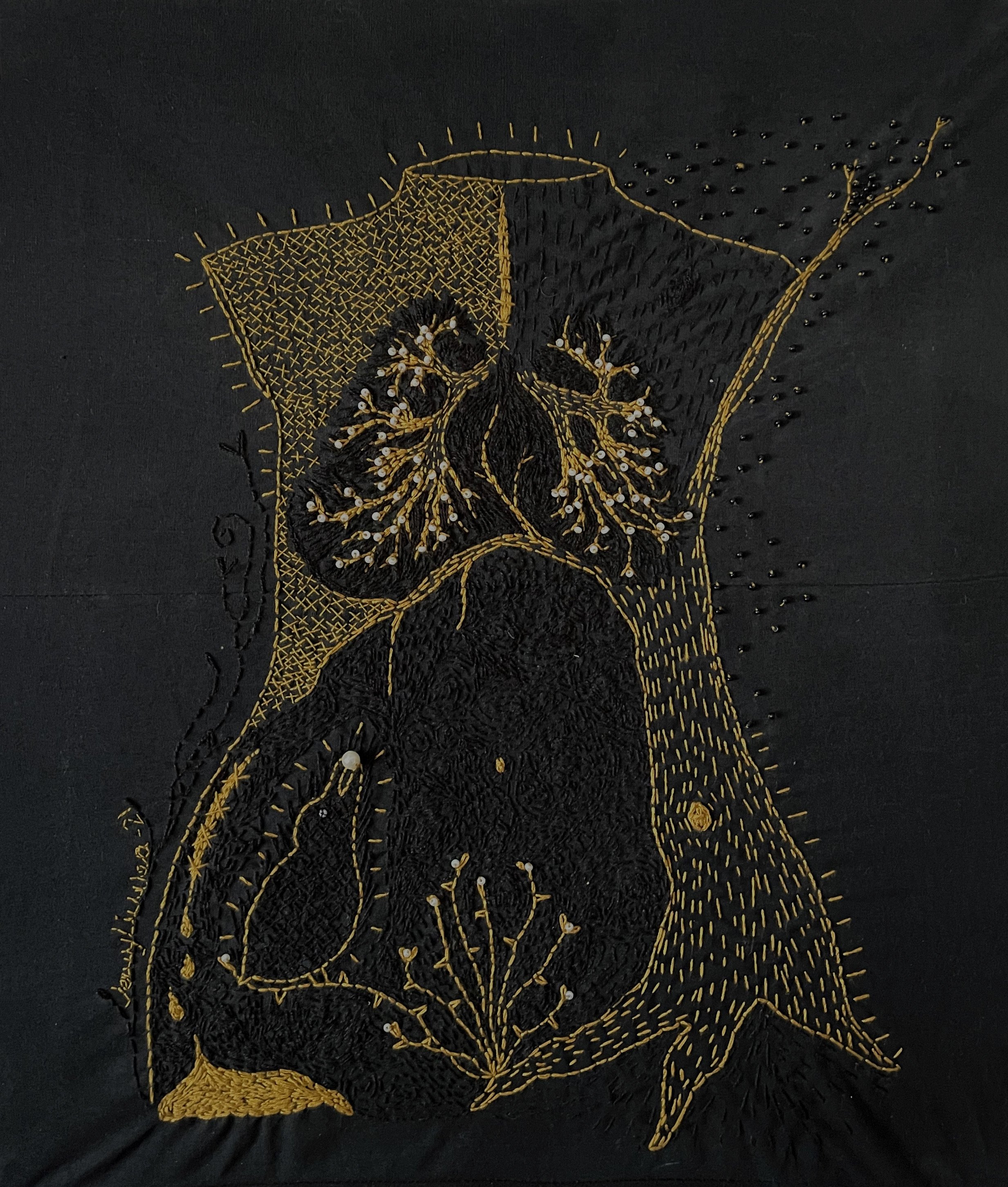 A female torso embroidered in yellow on black fabric. Part of the body is a tree trunk with roots into the ground. The lungs and their tissue are visible. There is a wound dripping blood on the side of the body. In front of it stands a corvid bird.