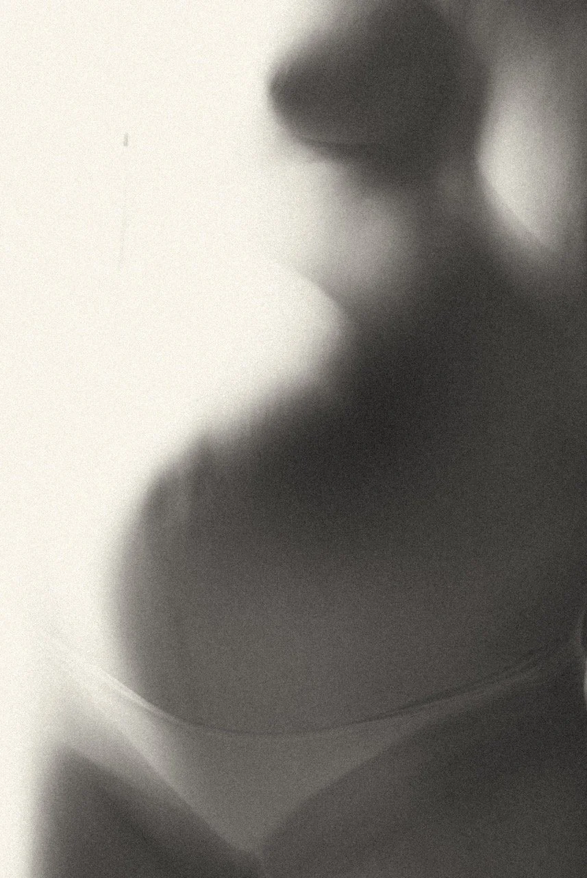 Soft focus silhouette of a pregnant body — an ethereal maternity portrait celebrating the beauty of pregnancy. Maternity photographer in Tokyo for expat and international families.