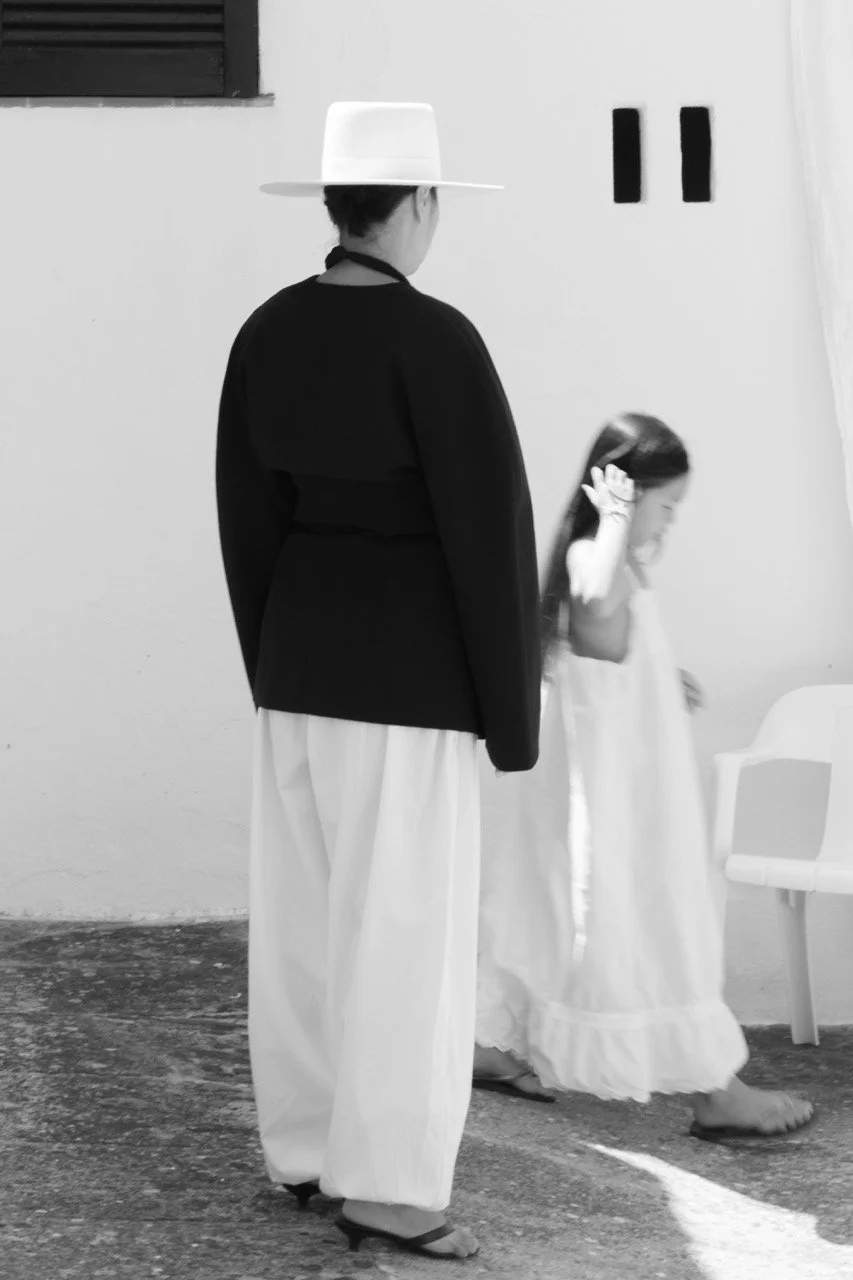 an elegant, unposed family moment photograph. Lifestyle family photographer available in Paris and Saigon and Tokyo