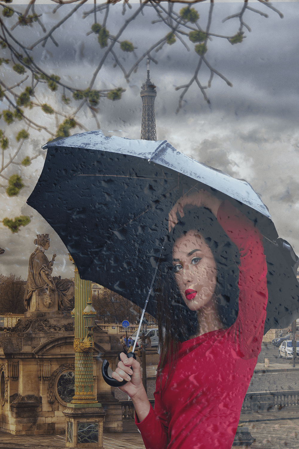 This Parisian scene is a result of several layers combined using Adobe Photoshop. The image of the woman with an umbrella was a stock image. I removed the background and added her to the Paris scene. The raindrop overlay reinforced her need for an um