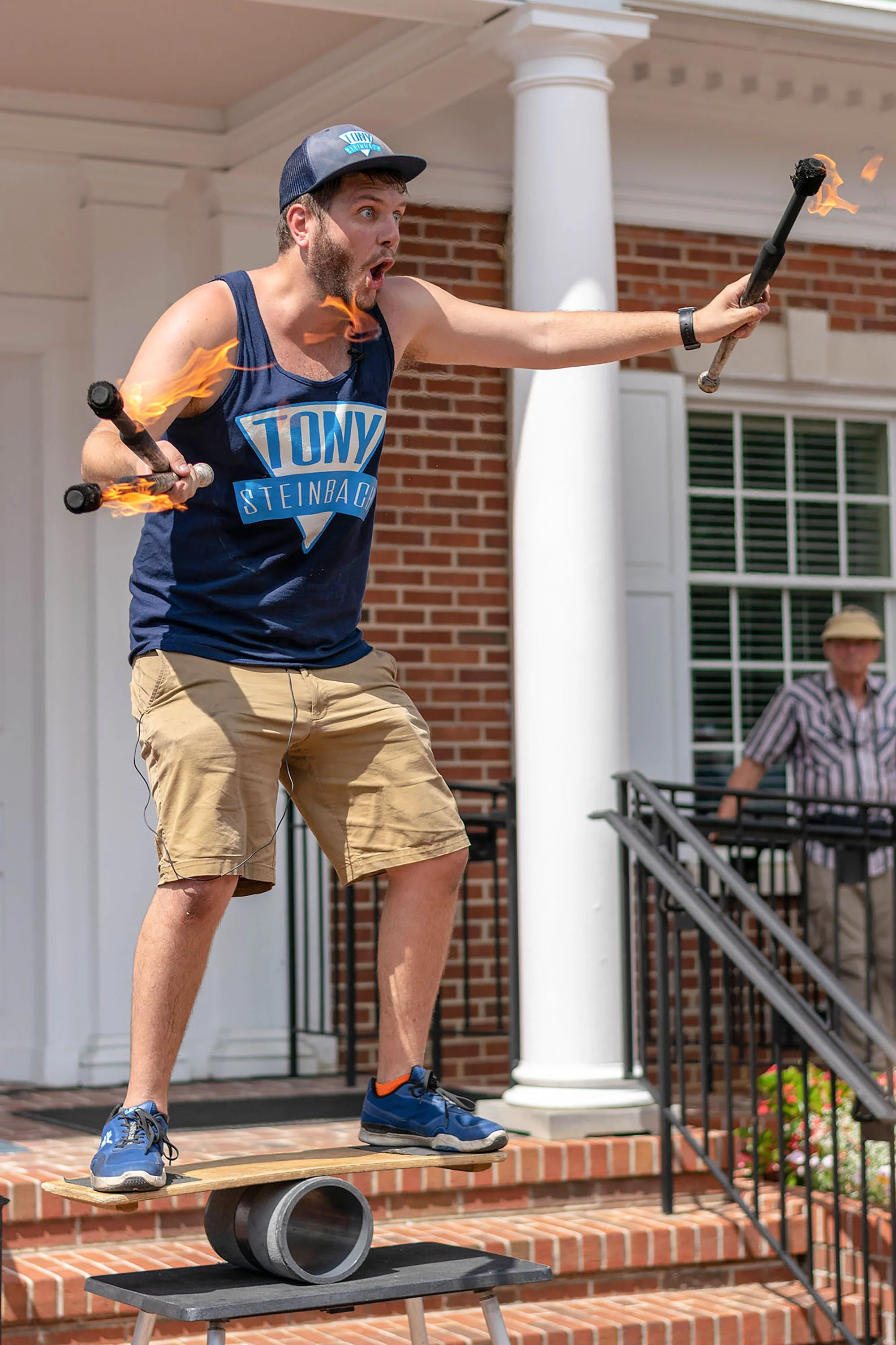 Tony Steinbach nails the ending of his fire juggling performance.