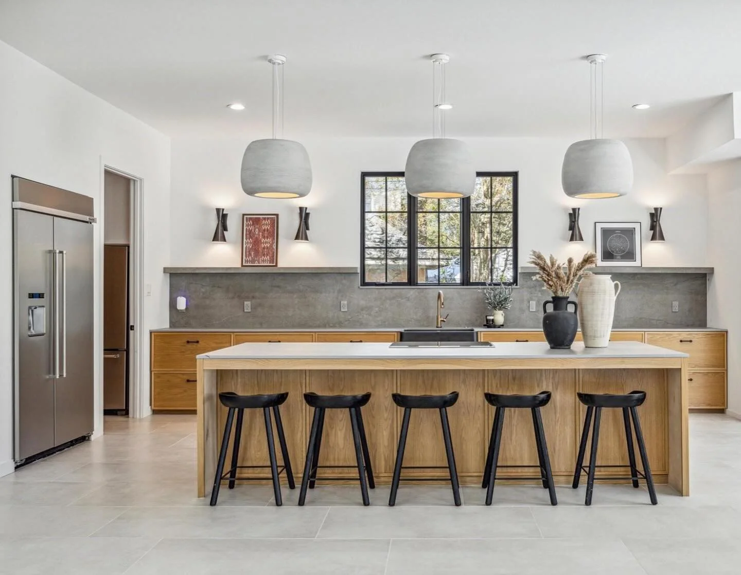 Staging is easy when the canvas looks like this! Absolutely in love with the pieces we brought in to this space. How good are those vases? 

This home features a scullery where the family does all of their day to day cooking. That means the kitchen l