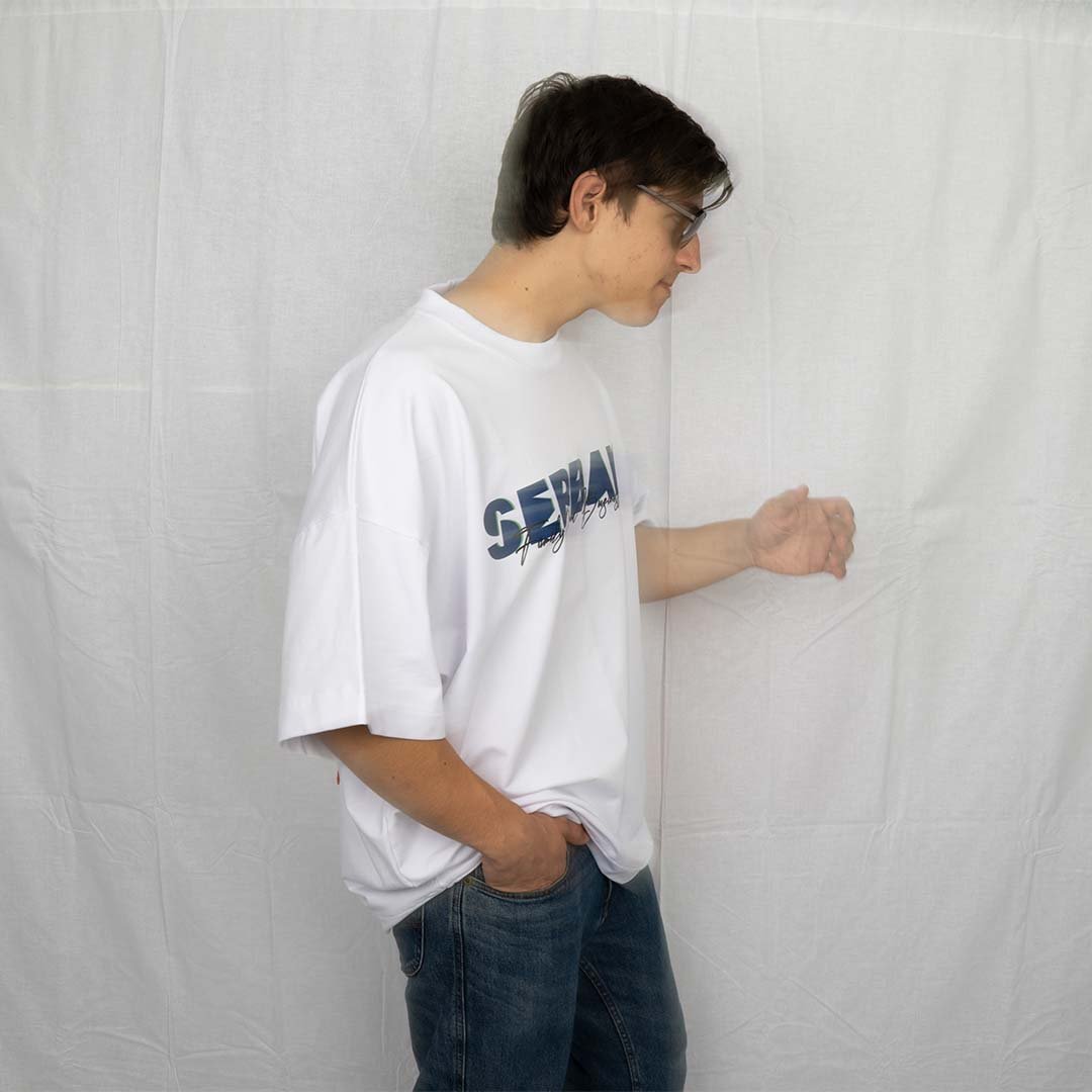 White printed oversized t-shirt, made from cotton and elastane. Premium quality streetwear. From the clothing brand, Serban.