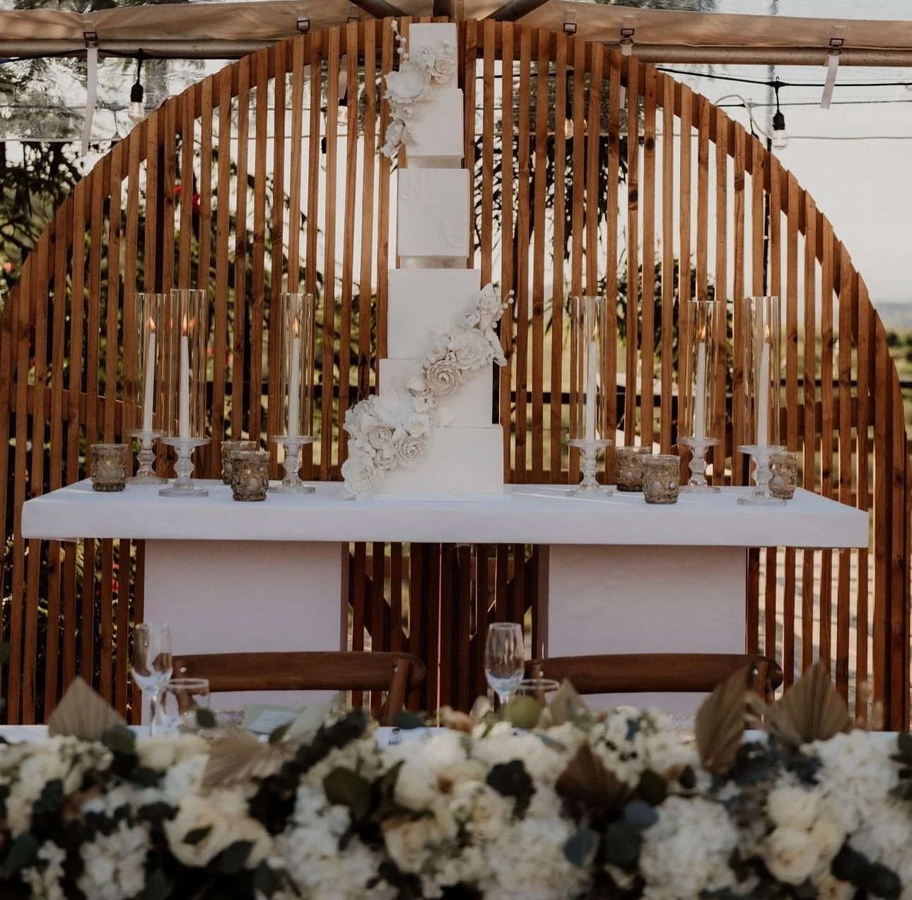In this moment, surrounded by the elegance of nature and the delicate beauty of timeless love, we celebrate a union as pure and enduring as the love that brought us here. Every detail, every petal, whispers a story of commitment, joy, and the journey
