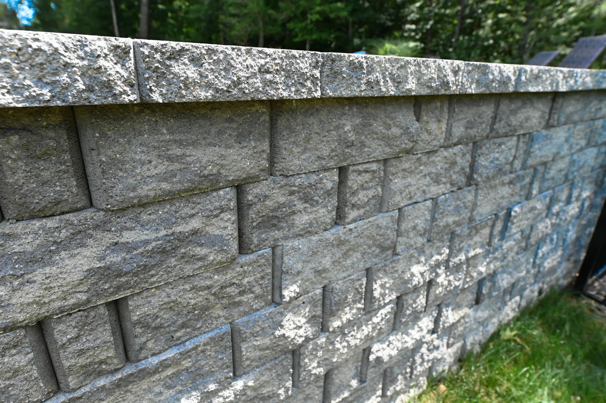 Every retaining wall we build combines top-tier materials with thoughtful design to enhance both function and beauty.

#OakValleyCustomHardscapes #OakValley 
#PaverPatio #HardscapeDesign #OutdoorLiving
 #HomeUpgrade #ProjectGallery #Pool