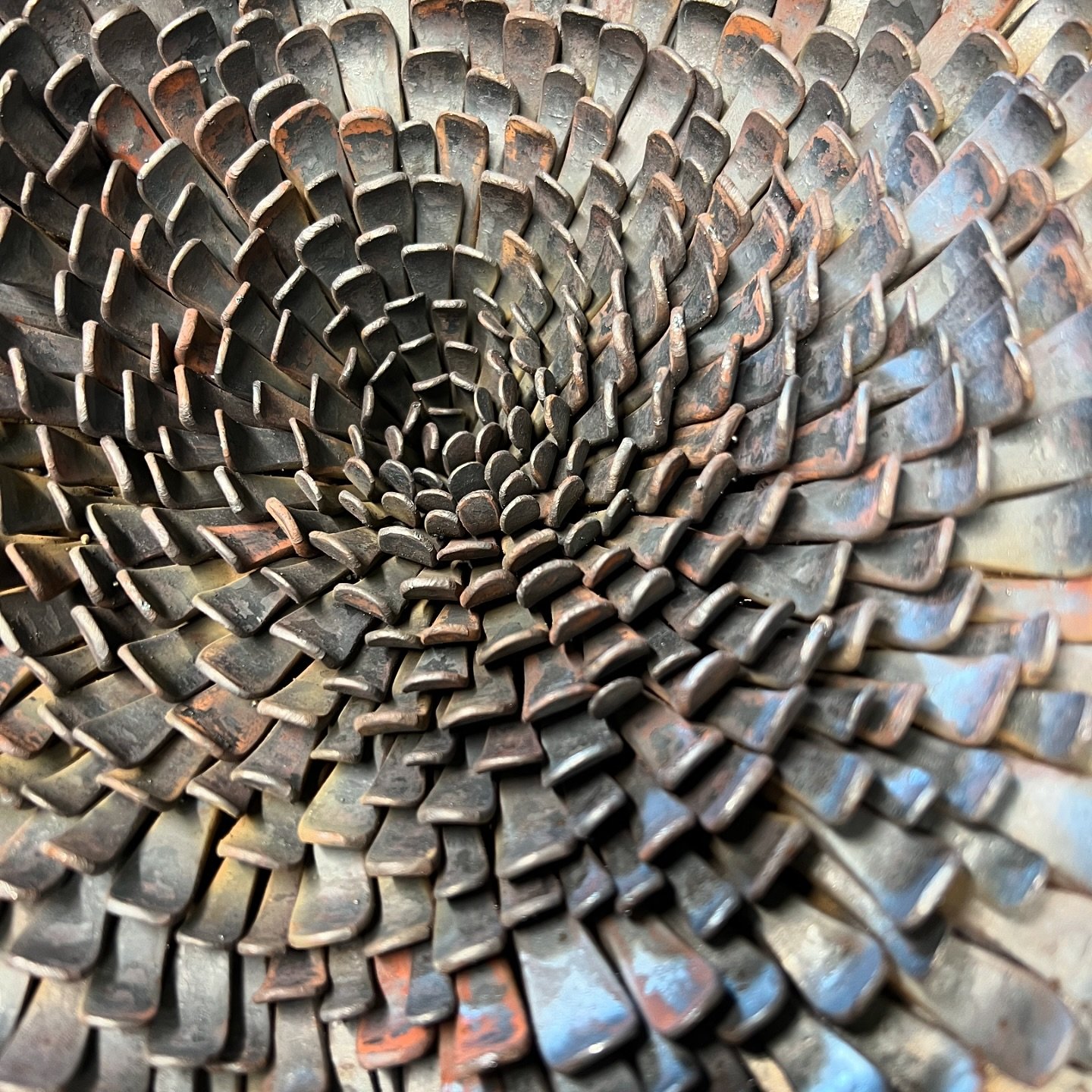 Technique - Heat colouring and Wax Coating

The final surface of my steel sculptures depends on the level of polishing, hammering for texture, and different types of sandblasting. When it comes to colour, heat plays a key role. Heating steel to speci