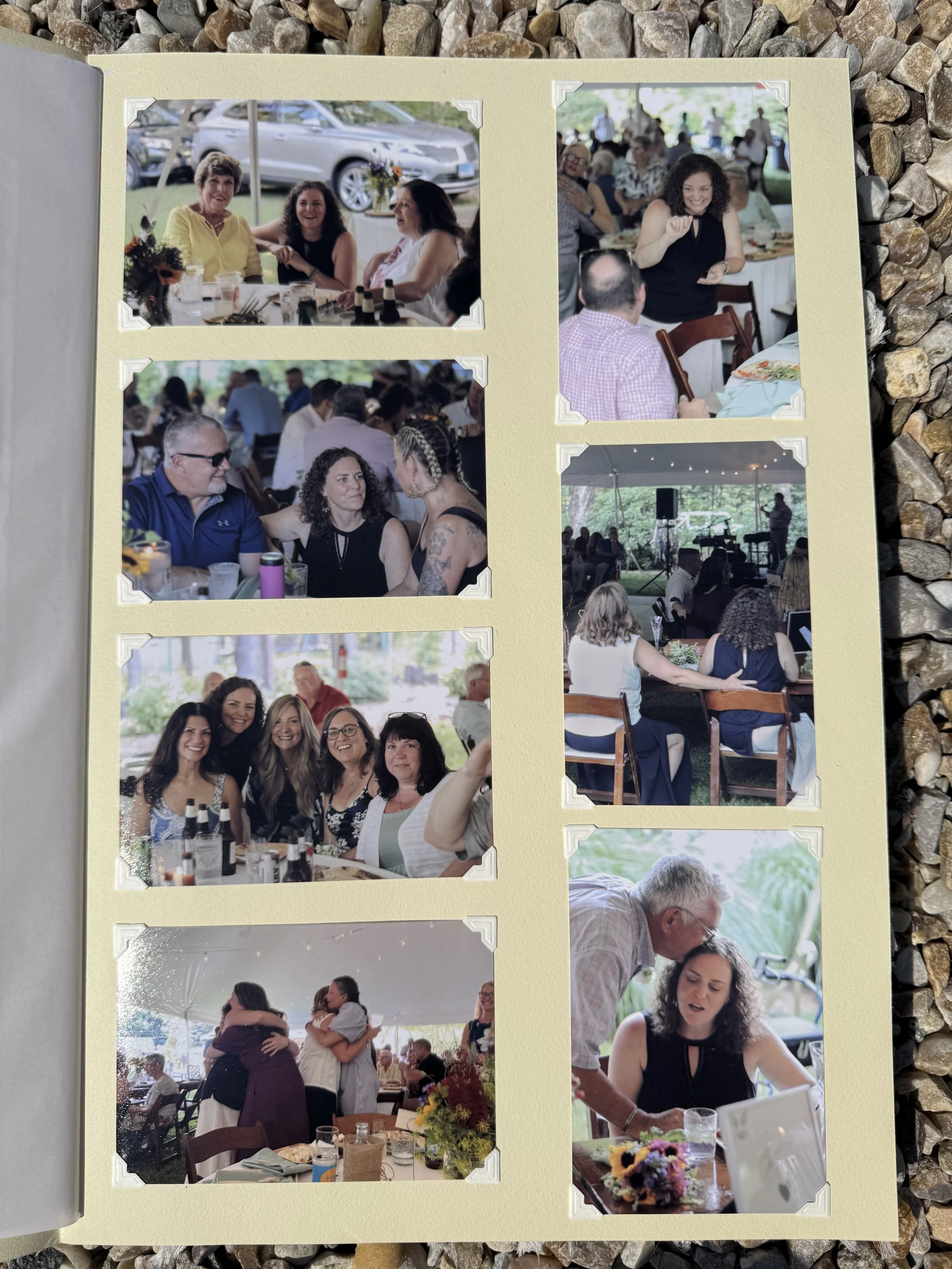 A series of seven photographs from a wedding reception, showing guests dining, talking, hugging, and celebrating in a tented outdoor setting with greenery and decorations.