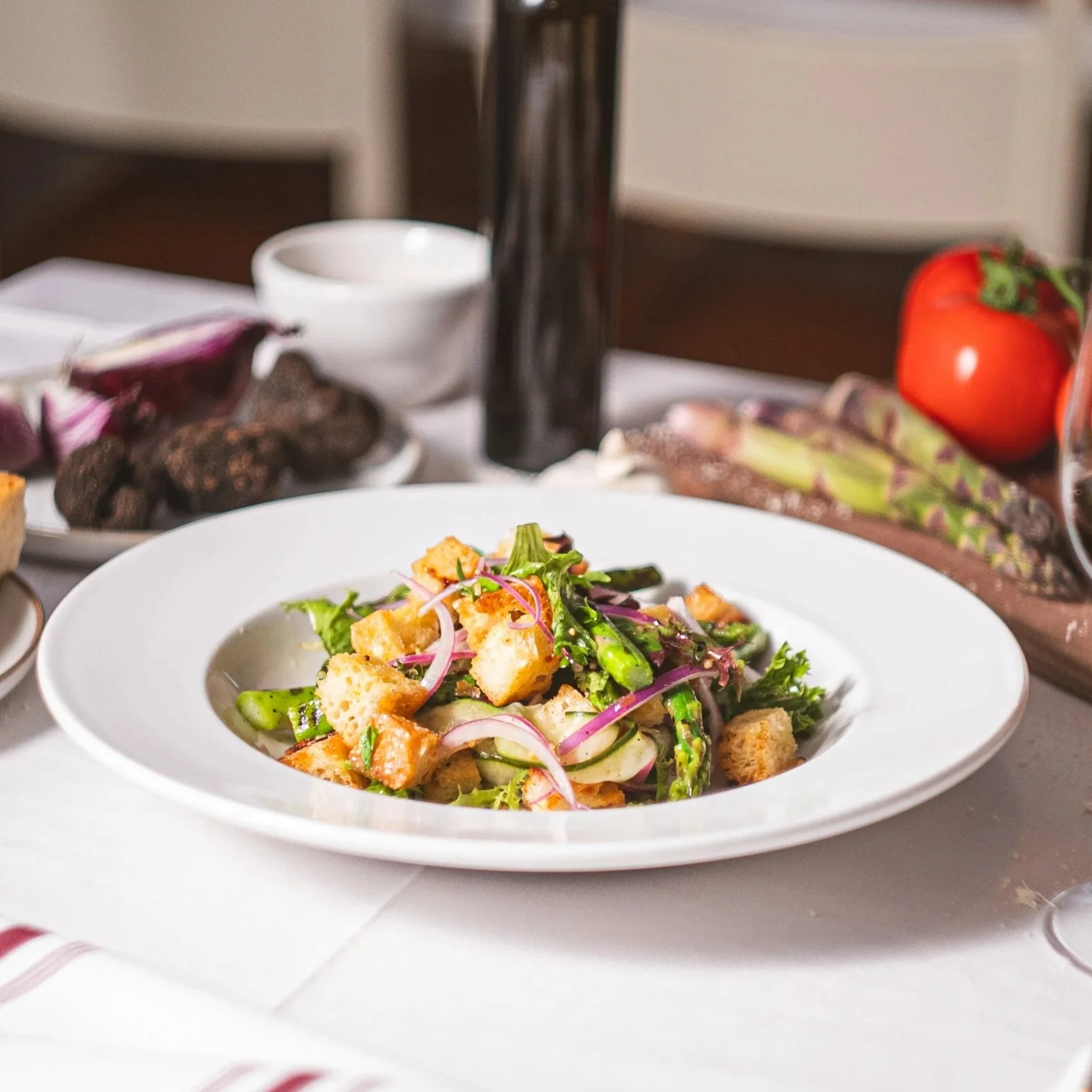 Grilled spring asparagus, focaccia croutons, red onions, cucumber and red wine vinaigrette