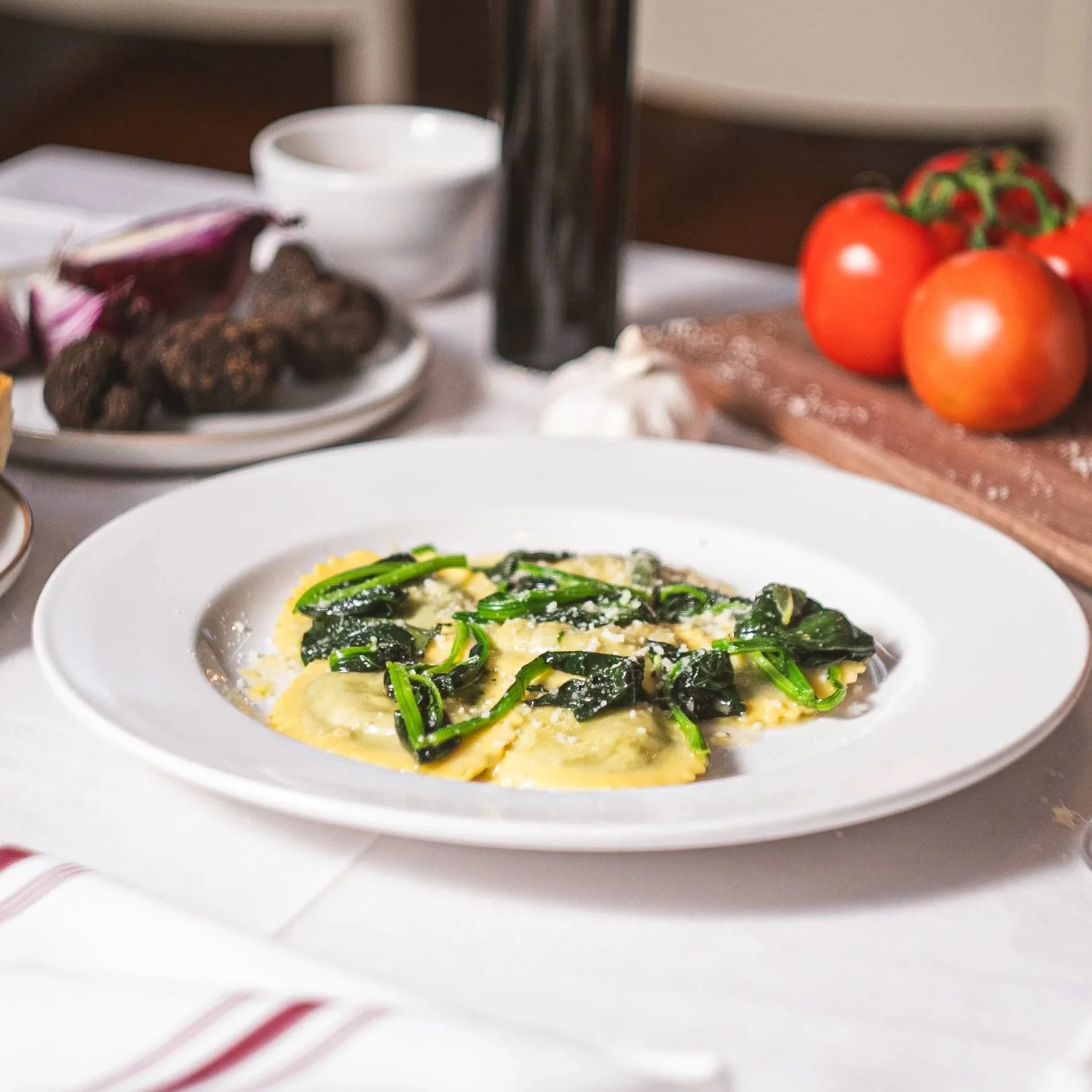 House-made pasta filled with creamy ricotta and tender spinach, finished with brown butter, sage, and Parmigiano Reggiano.