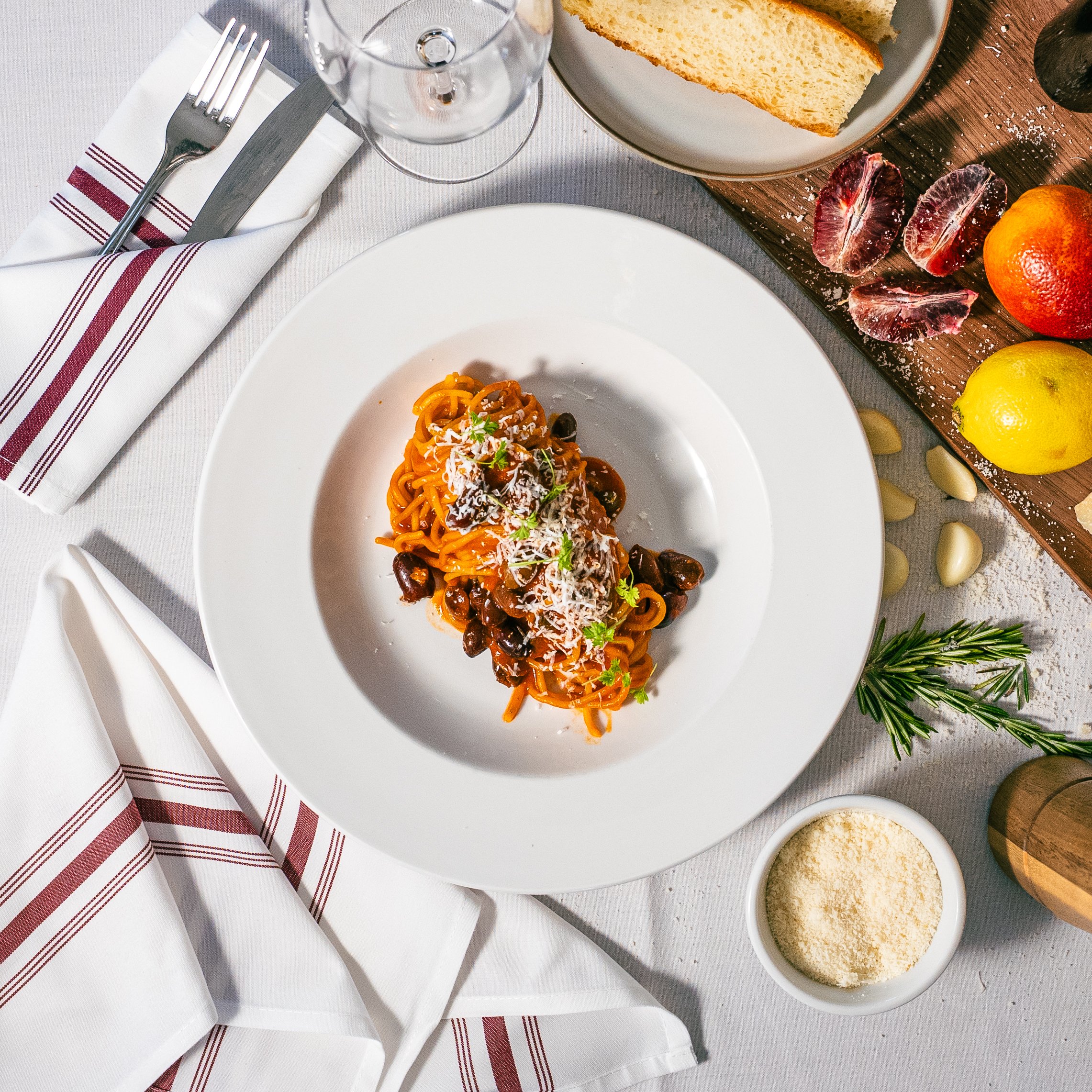 Hand-rolled Spaghetti, capers, olives, anchovies, ricotta salata