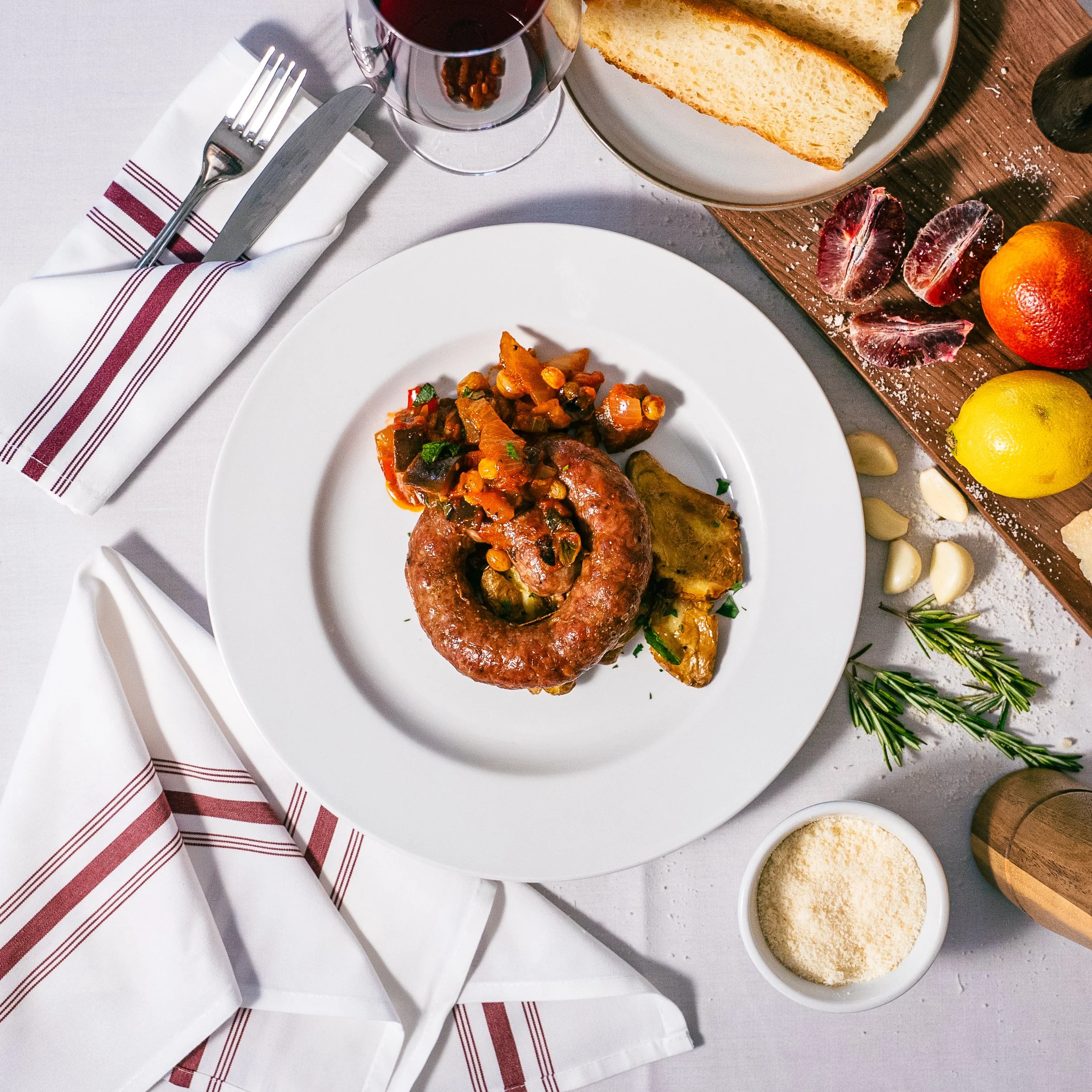 Wild boar sausage, smashed potatoes, and caponata. 