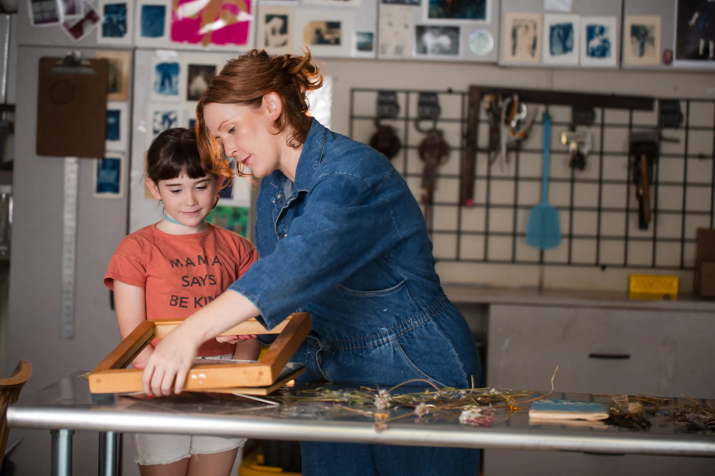 Katharine T. Jacobs and her daughter in home art studio