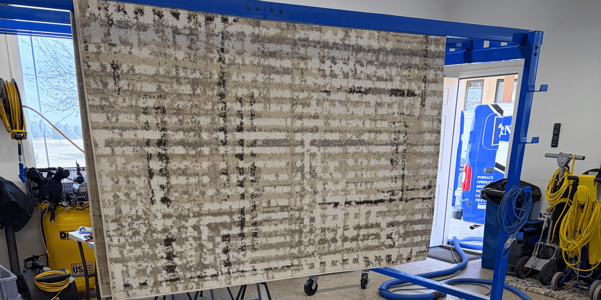 Carpet Drying on a rack at our cleaning center