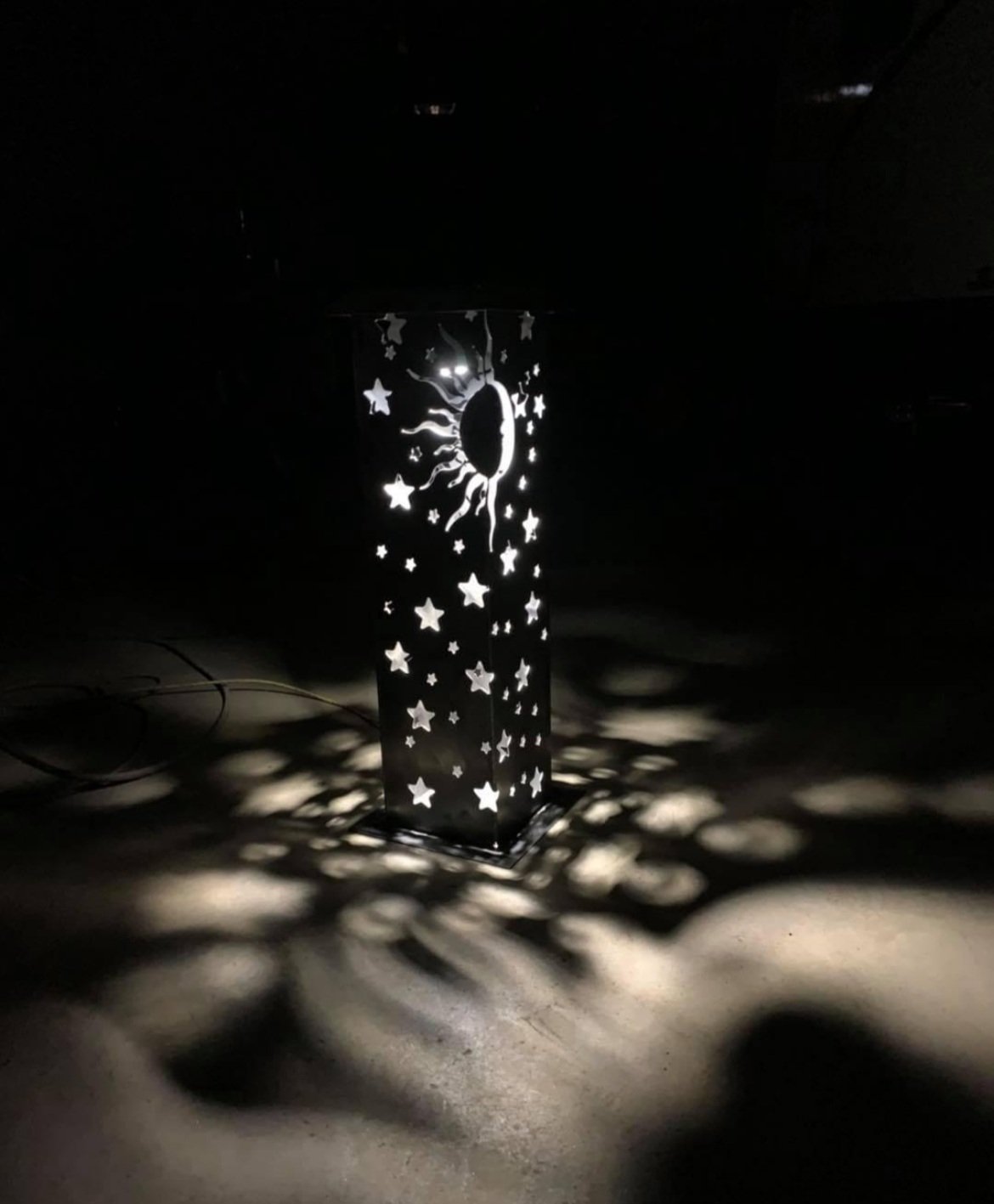 Modern metal artwork commission with lights, ideal for enhancing interior or exterior spaces