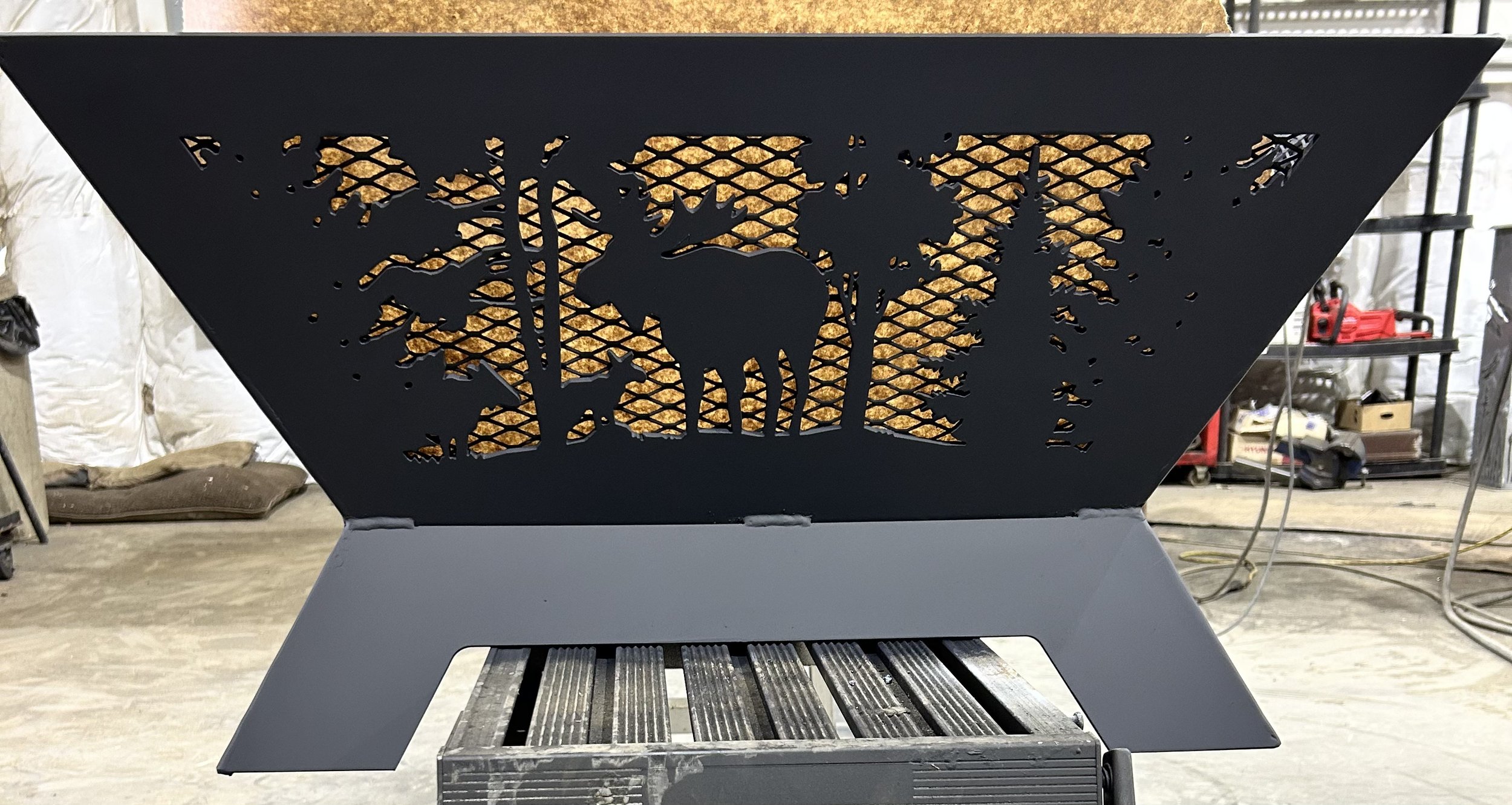 Unique outdoor firepit featuring personalized design, plasma-cut for precision and built to withstand Canadian winters