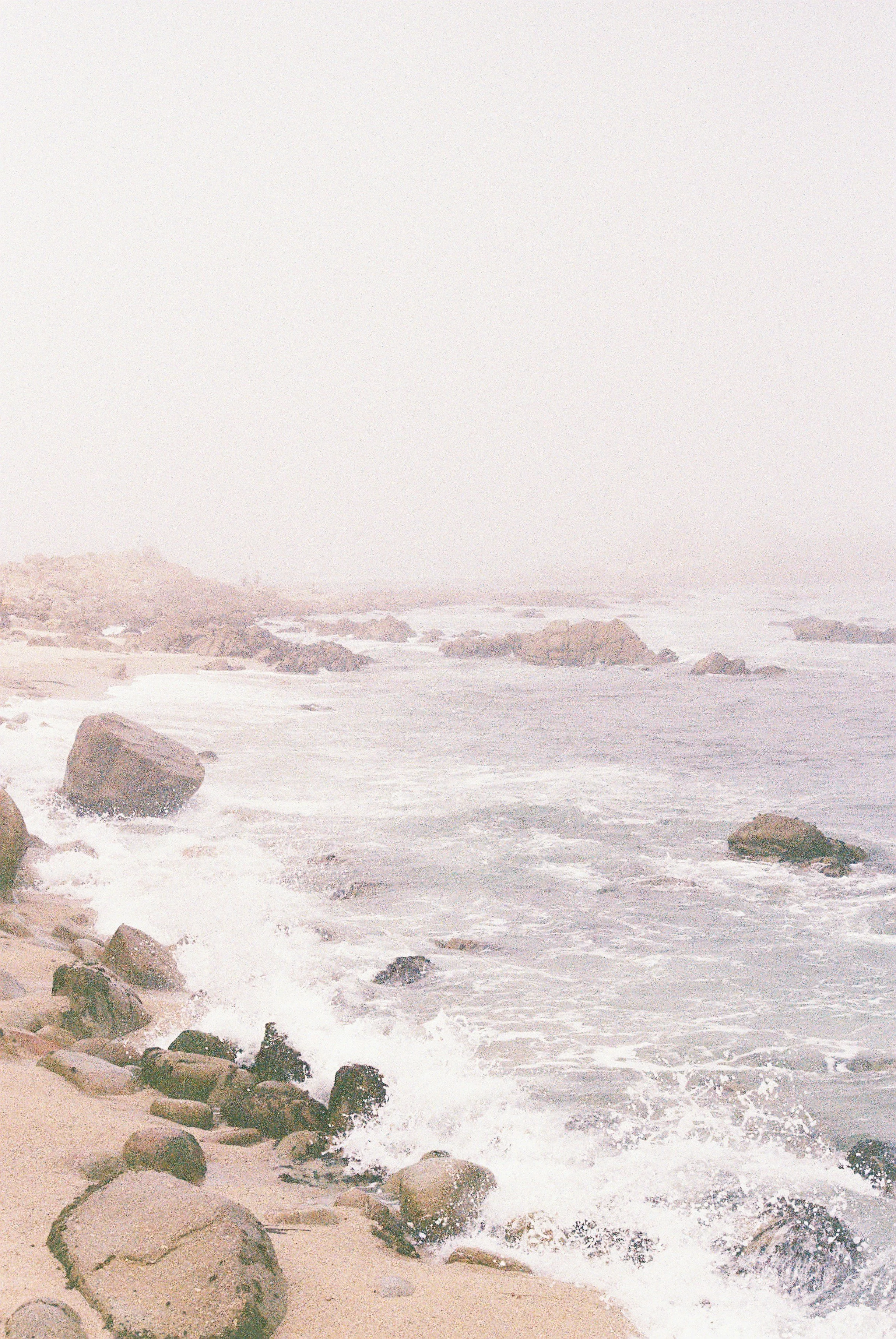 Waves crashing on a beach metaphorically representing a value clash