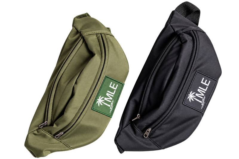 Close up image of both the black and green Easy Packs, a wheelchair accessory bag.