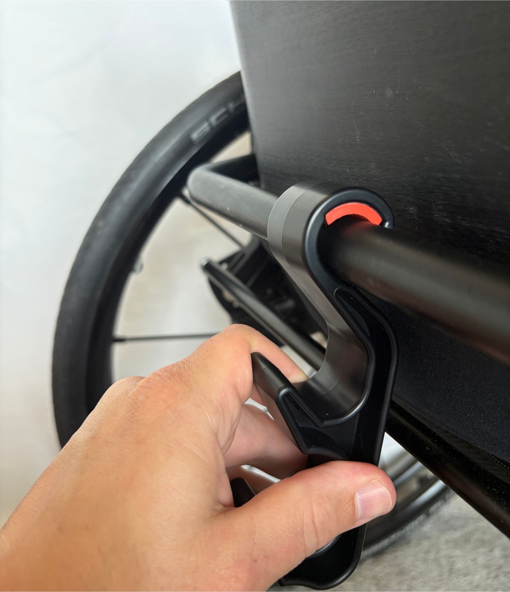 Grabbing the Easy Hang to remove it off the 3/4" tubing.