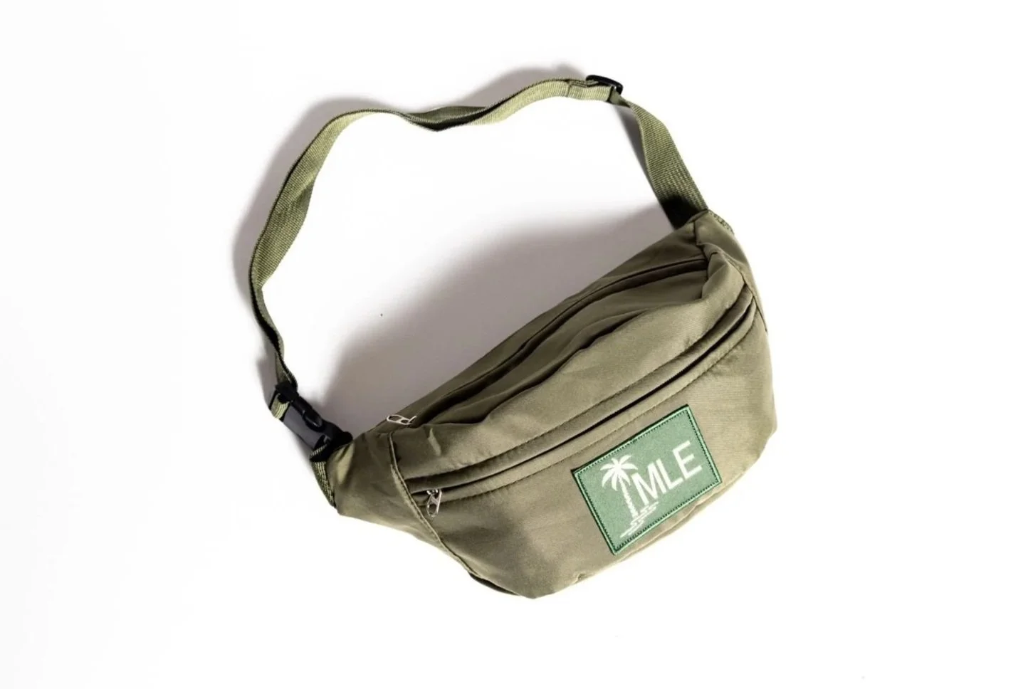 Close up image of the green Easy Pack, a wheelchair accessory bag.