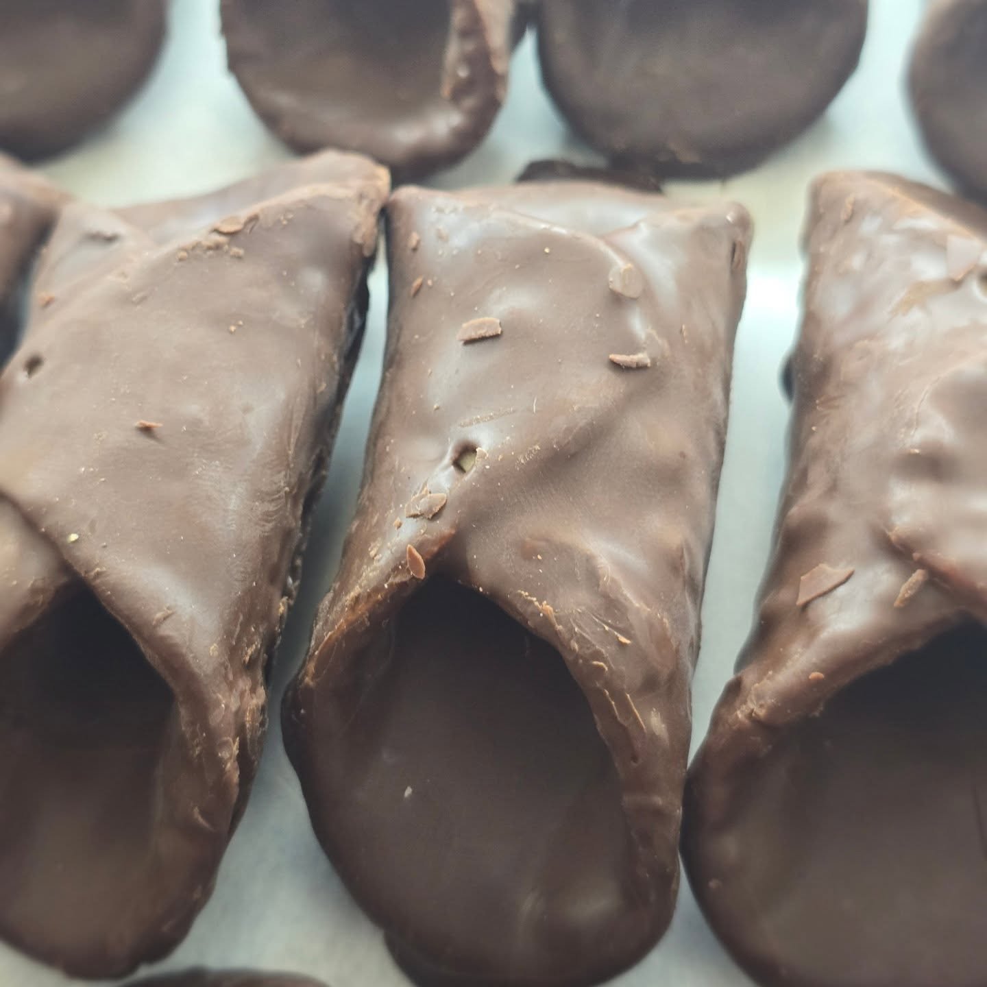 We have chocolate dipped cannoli shells! Stop in today!!! #bakery #bakerylife #bakerytiktok #dough #bakingchronicles #baker #pastry #richthebaker #antoinespastryshop #shopsmallbusiness #shoplocal