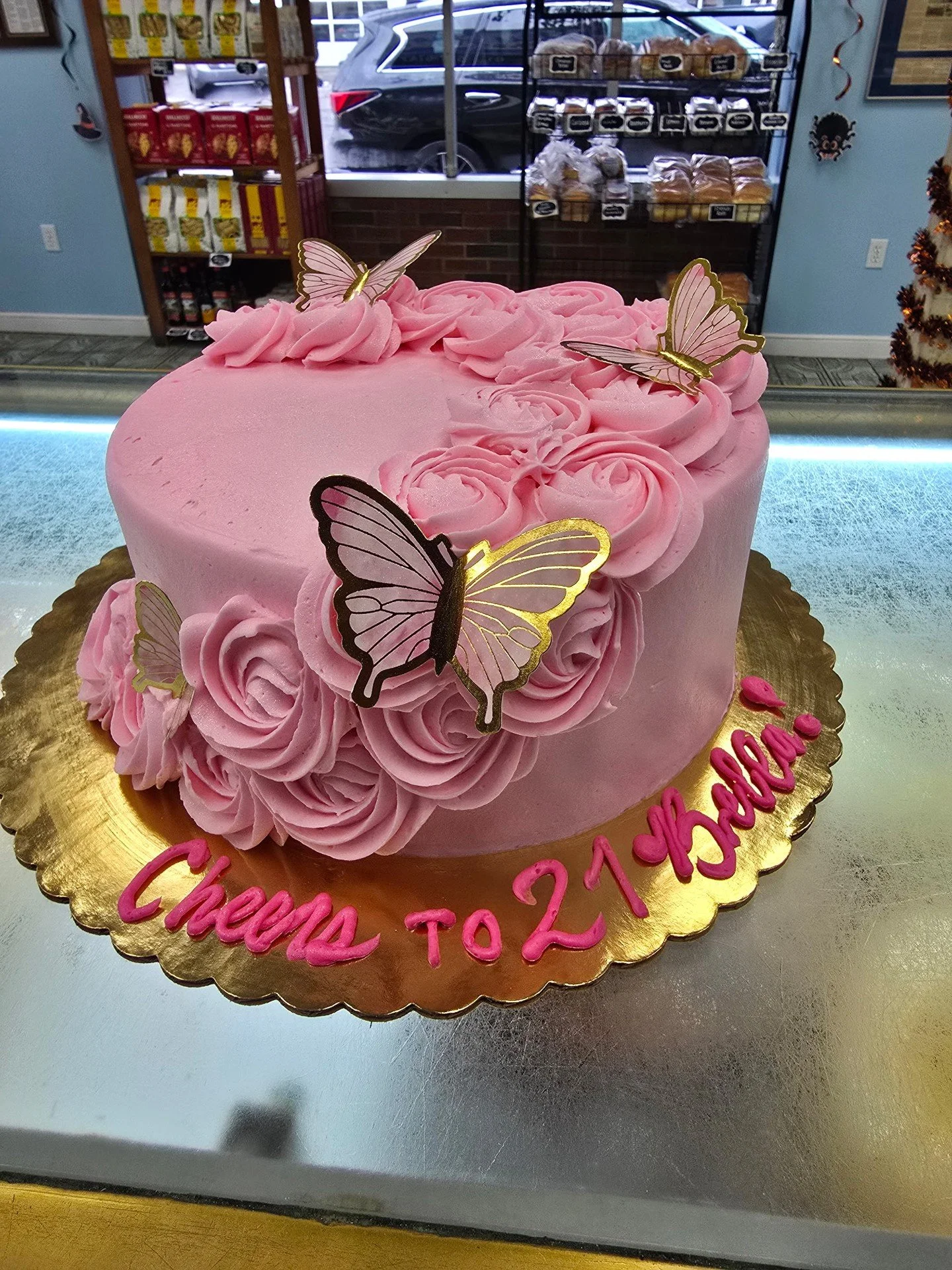 Cheers to 21 Bella! #antoinespastryshop #baker #bakery #21stbirthday #Cake #cakes #richthebaker #butterflycake