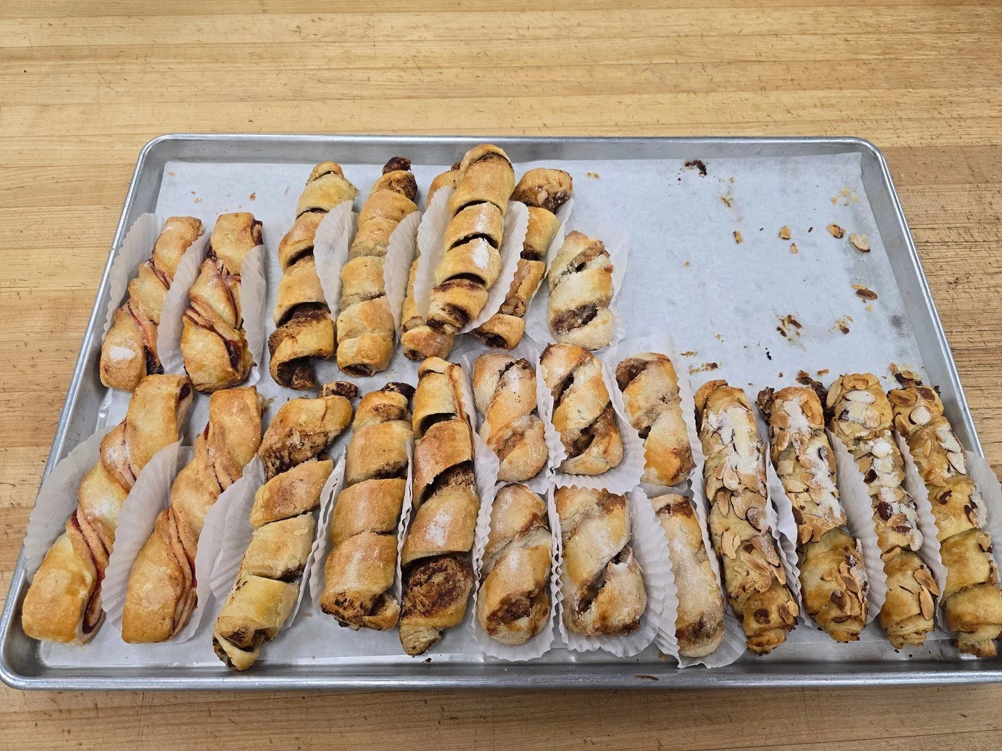 All of our great Pastry Twists! We have raspberry, nutella, apple, and almond! #richthebaker #antoinespastryshop #pastry #handmade #bakery #baker #shoplocal #shopsmall #freshpastries