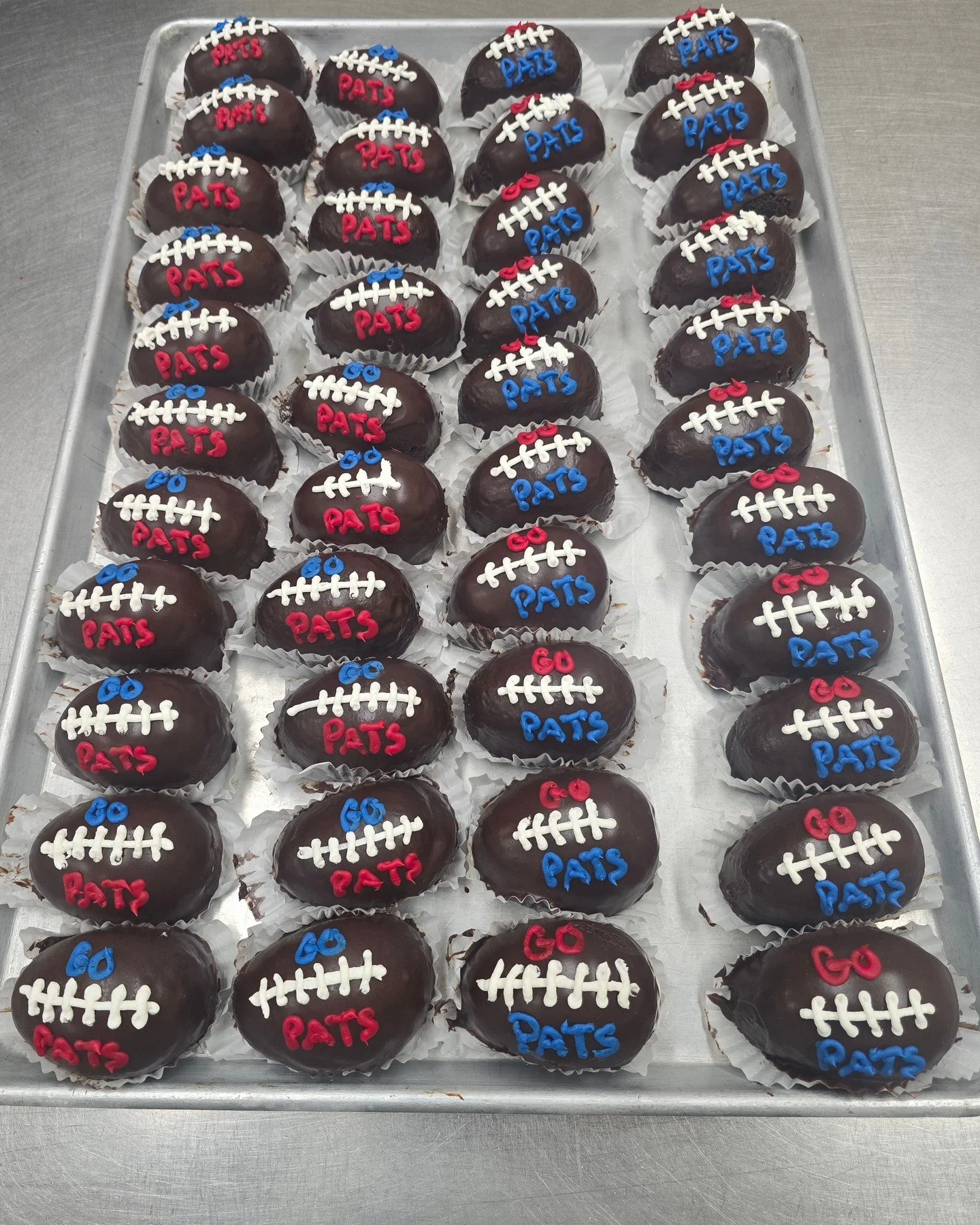 Go Pats!! We have chocolate footballs! Stop in today!! #antoinespastryshop #nfl #patriots @patriots #football #playoffs #chocolate #richthebaker #cake #cakes #sports #icing