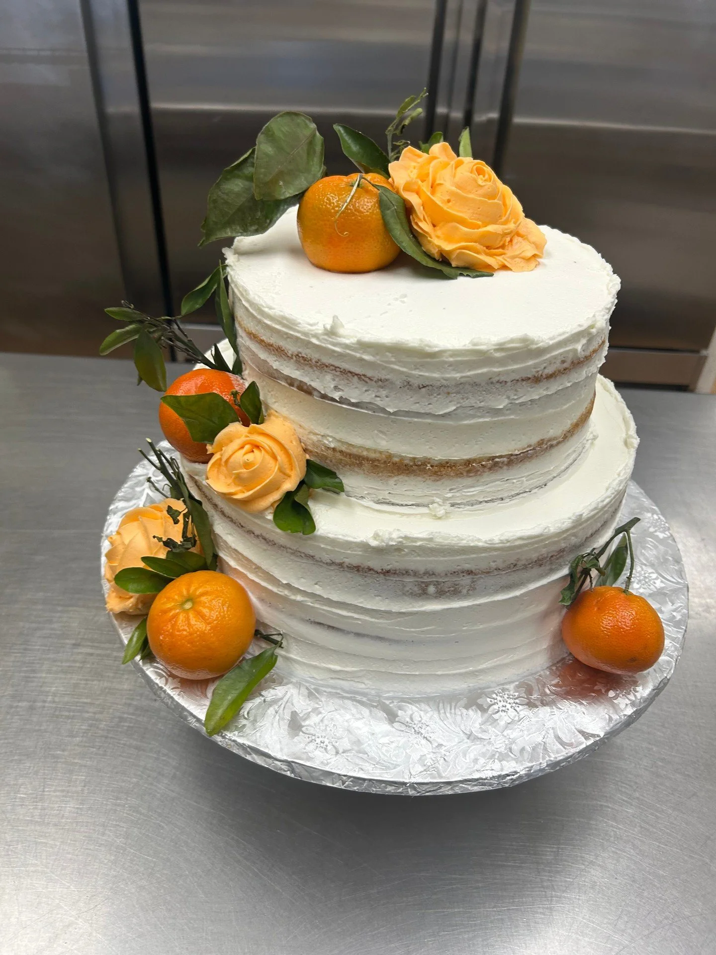 Fresh oranges are the best on cakes!! #antoinespastryshop #cake #cakes #decoration #oranges #stemandleaf