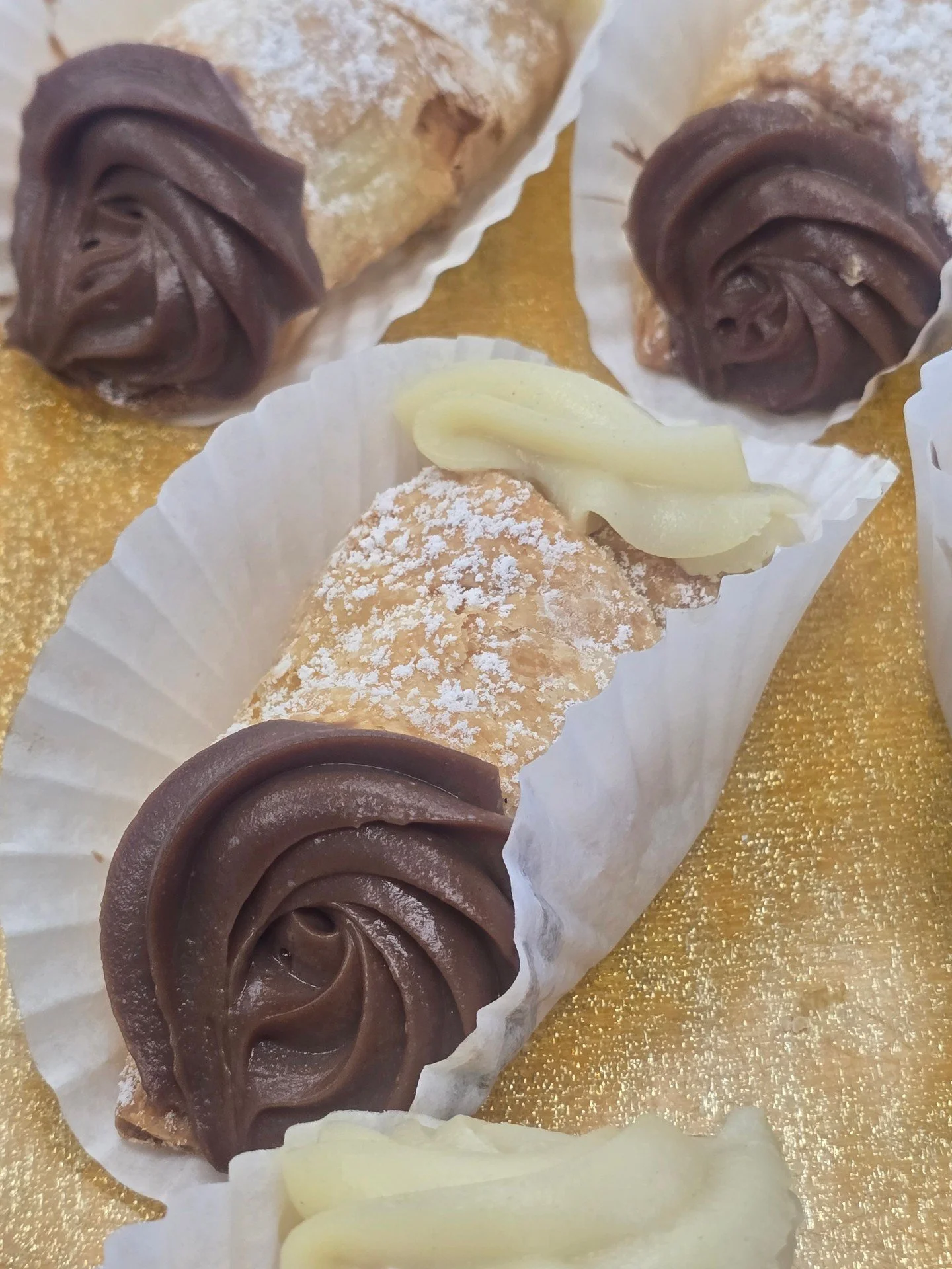 Cream Basket!! Baked cannoli shell filled with chocolate custard and vanilla custard! #antoinespastryshop #pastry #pastries #italian #italy #freshpastries #richthebaker