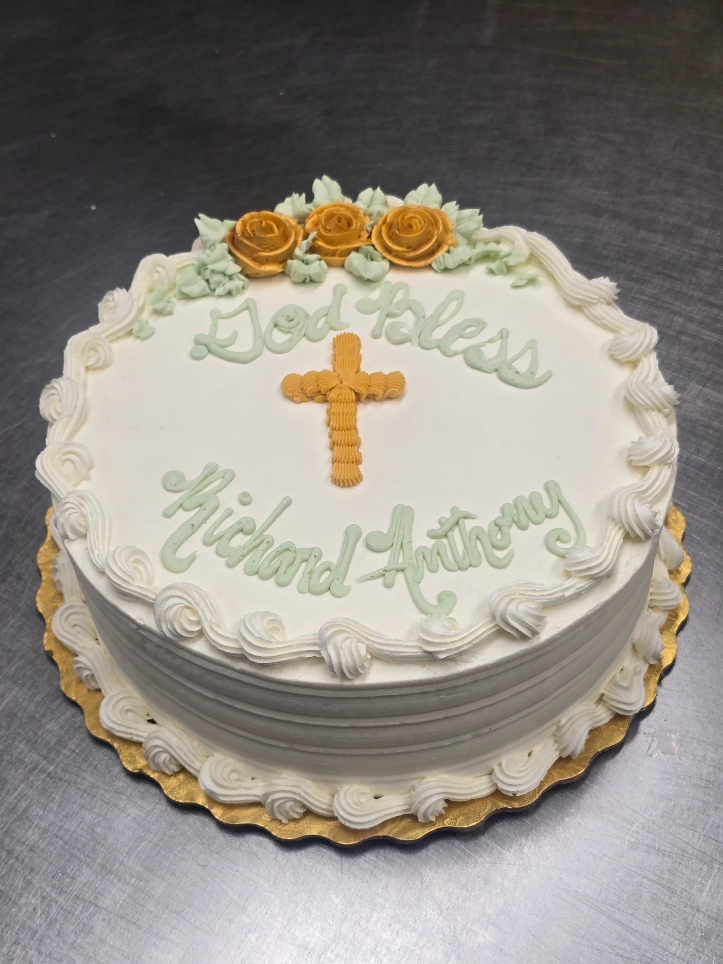 God Bless Richard Anthony! #antoinespastryshop #cake #cakes #frosting #gold #goldcross #vanilla #goldroses #richthebaker