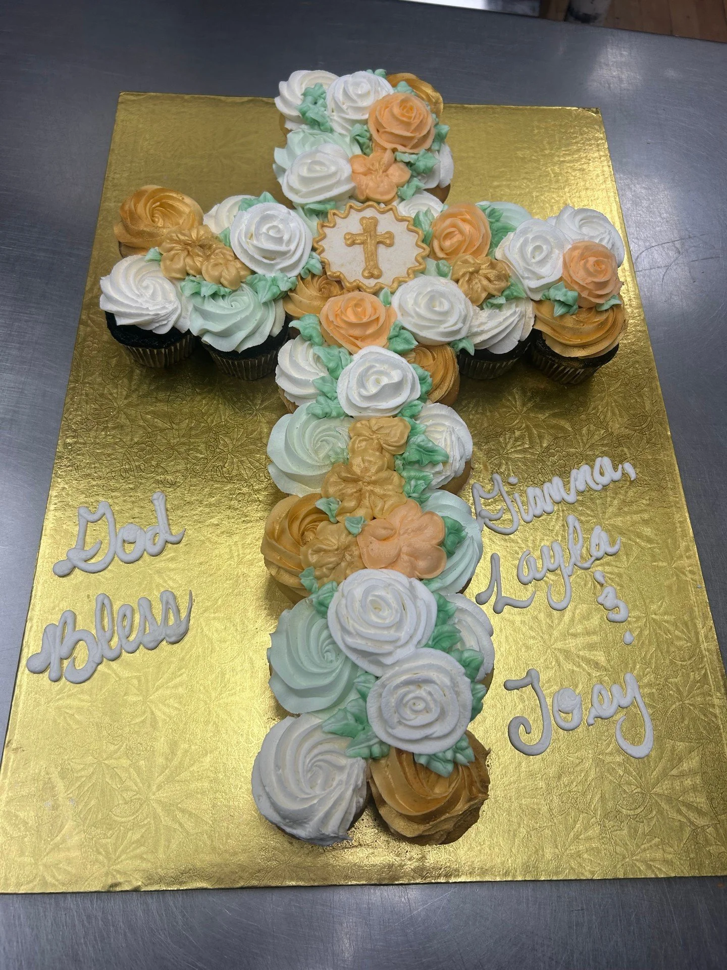 God Bless Gianna, Layla, and Joey! #antoinespastryshop #god #godbless #cupcakecake #cross #gold #richthebaker #roses