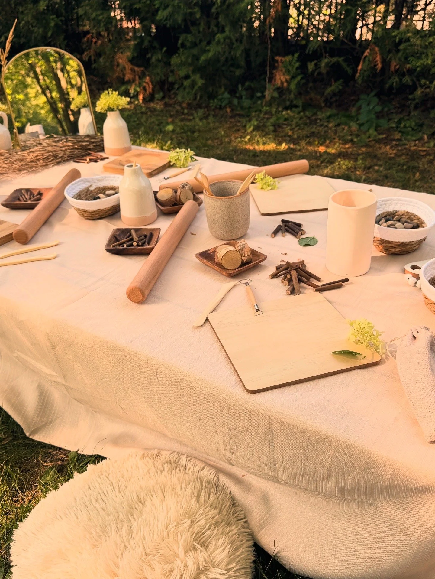 Part Two - Clay Play
Each child and parent had their own boards and shared tools. They had gathered their own natural items to enhance their play.
