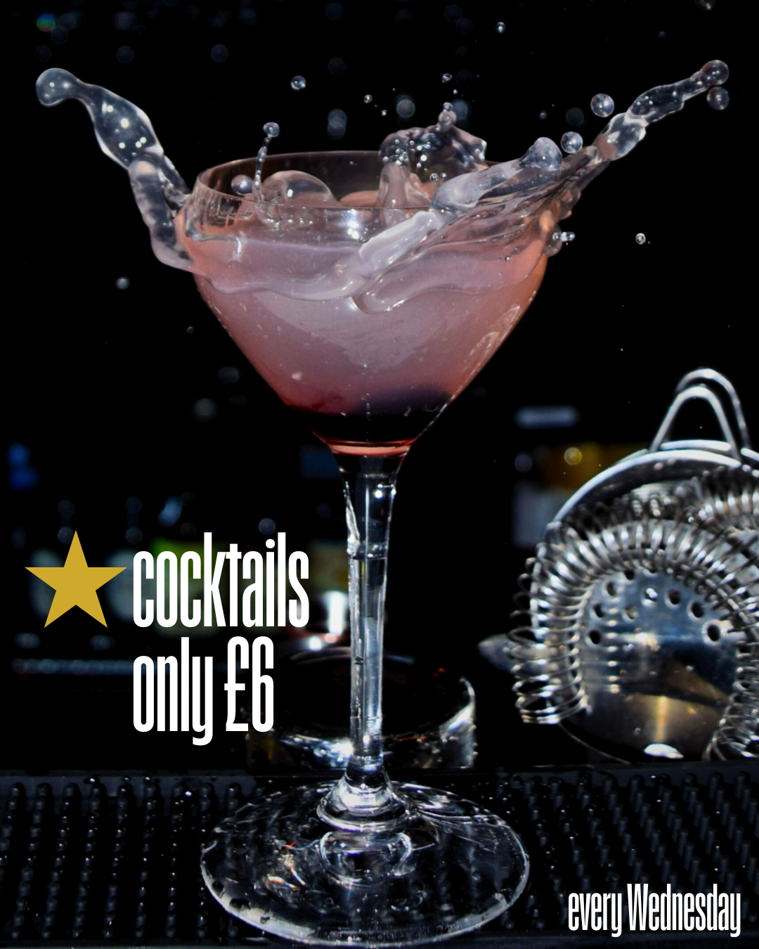 A pink cocktail in a martini glass splashing with droplets, advertising cocktails for £6 every Wednesday at JoJo's Cocktail & Pizza Bar, Cowley, Oxford.