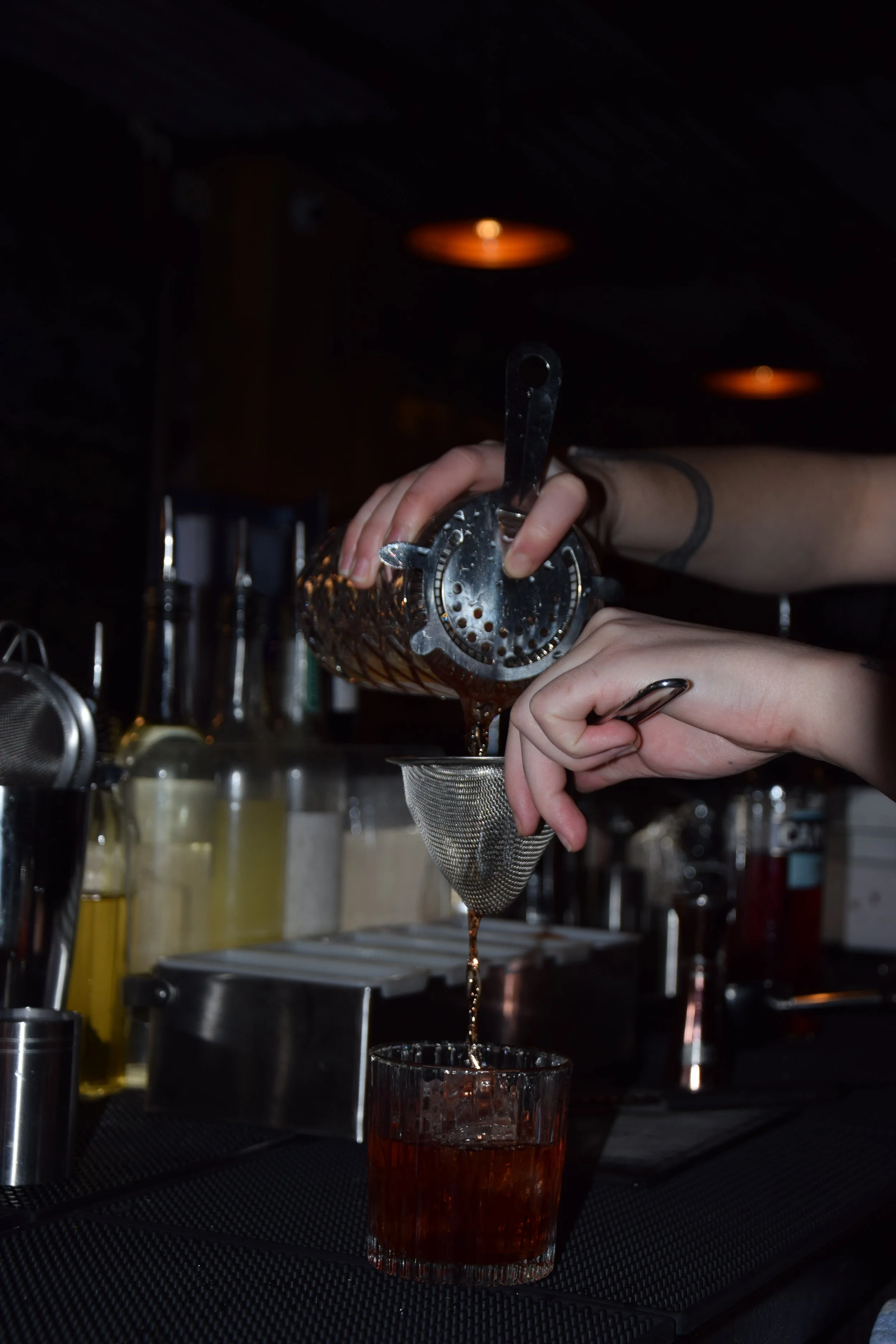 a drink is poured at JoJo's Cowley Road, Oxford