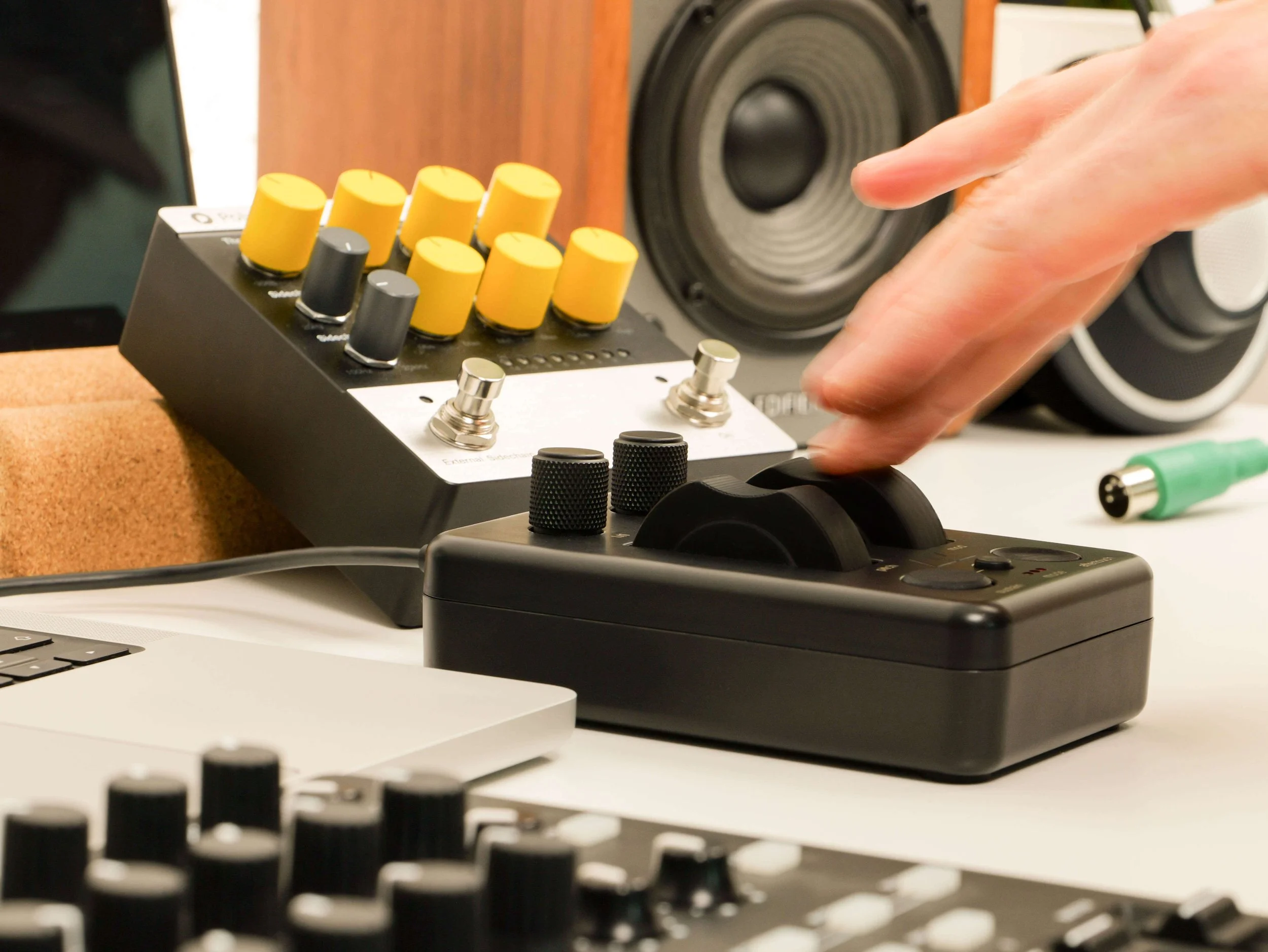 Fast movement shot of the MODPOD controller in action bending the pitch of a sample in real time