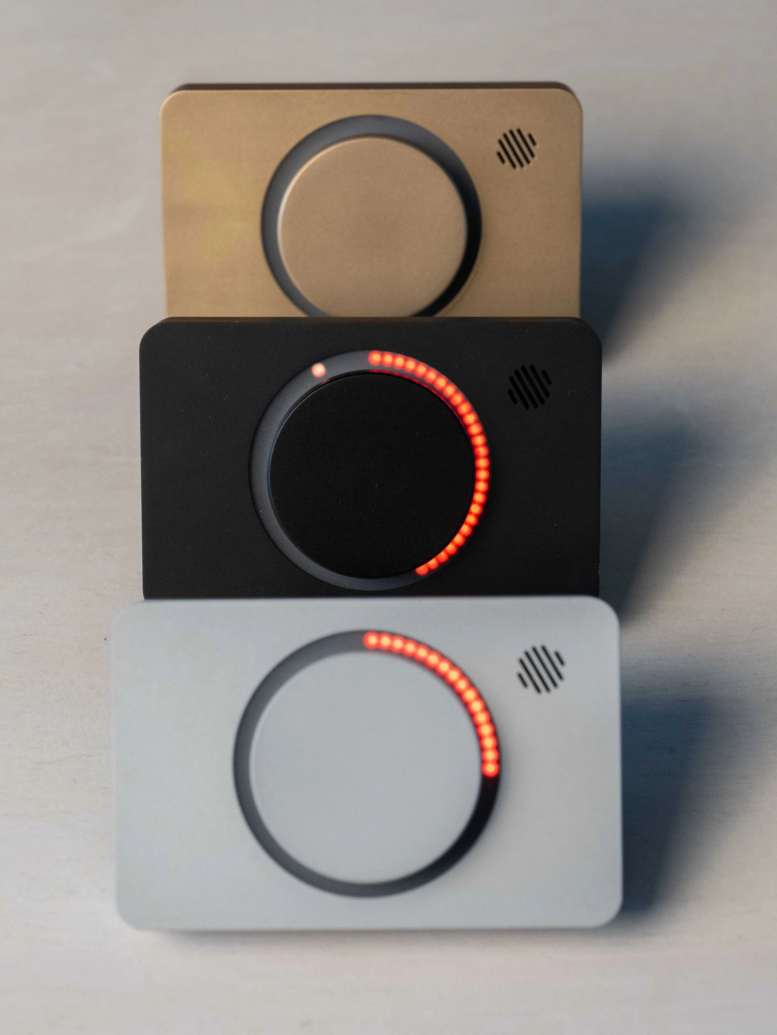 Three colour way and material finish variations of the Pomodoro Timer made by Engineering Lab