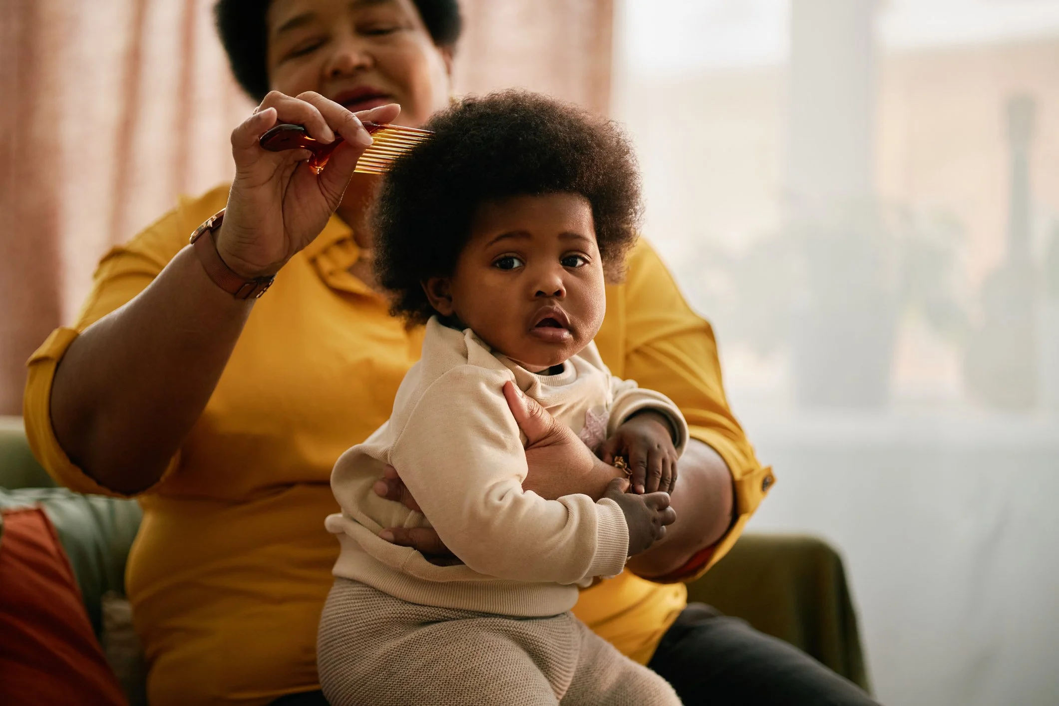 Sacred Tresses: Raising a Black Child Means Caring for Their Crown