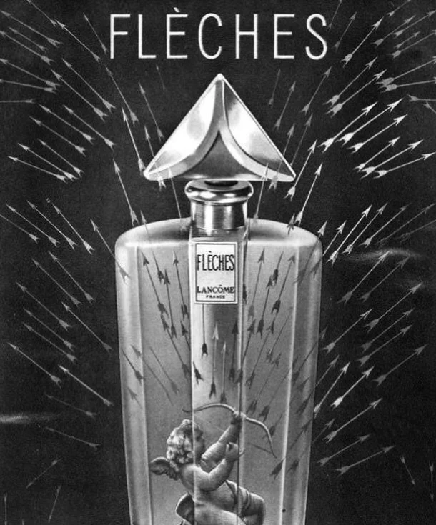 Annons fr&aring;n 1947 f&ouml;r Fl&egrave;ches fr&aring;n Lanc&ocirc;me, vars namn betyder pilar och d&auml;r parfymen presenteras som ett slags k&auml;rlekens projektil, vars doft likt Amors pilar kan tr&auml;ffa b&aring;de ov&auml;ntat och omedelba