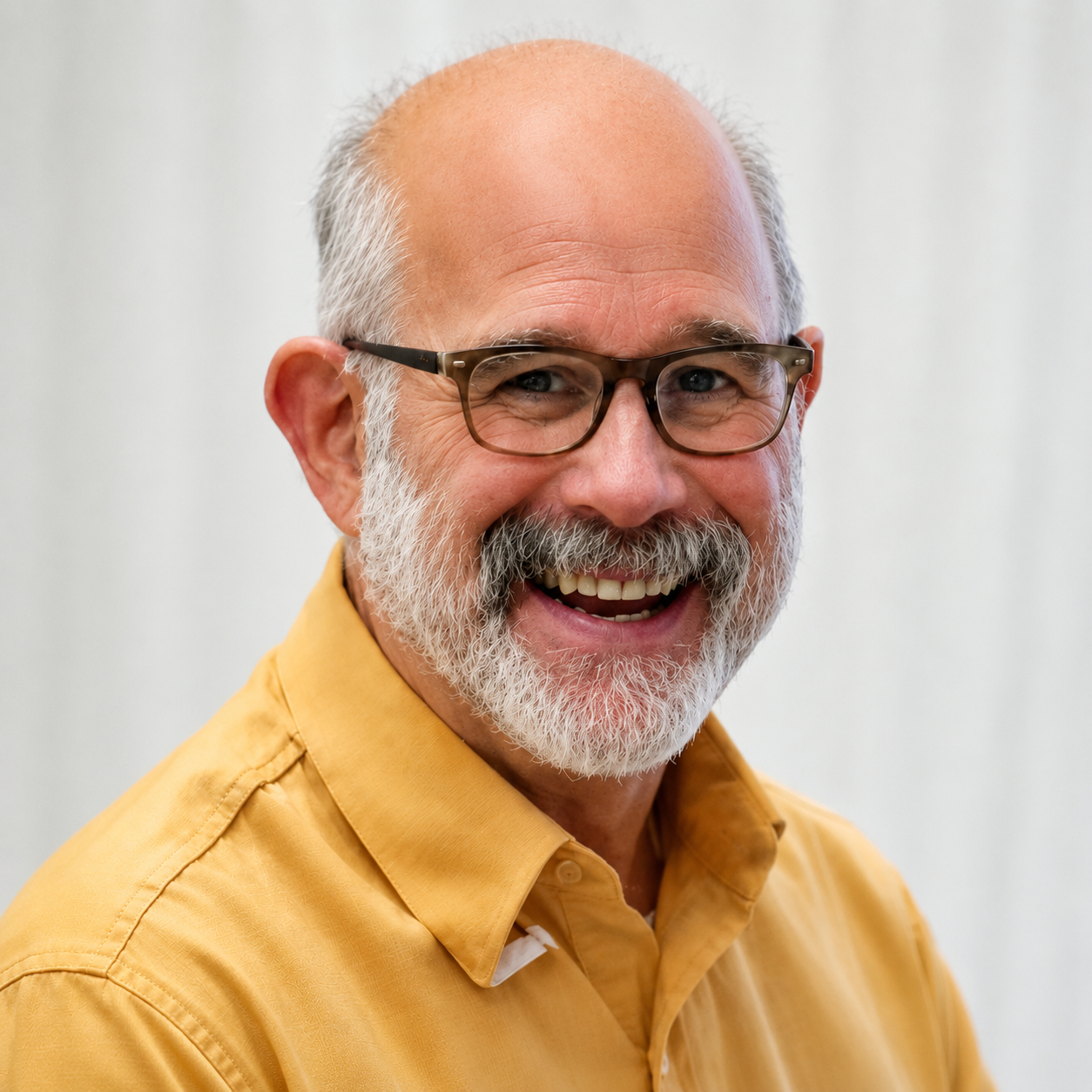 an image of Alan Wenderoff smiling at the camera