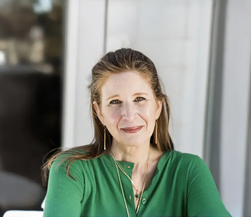 an image of Jen Dembo smiling at the camera